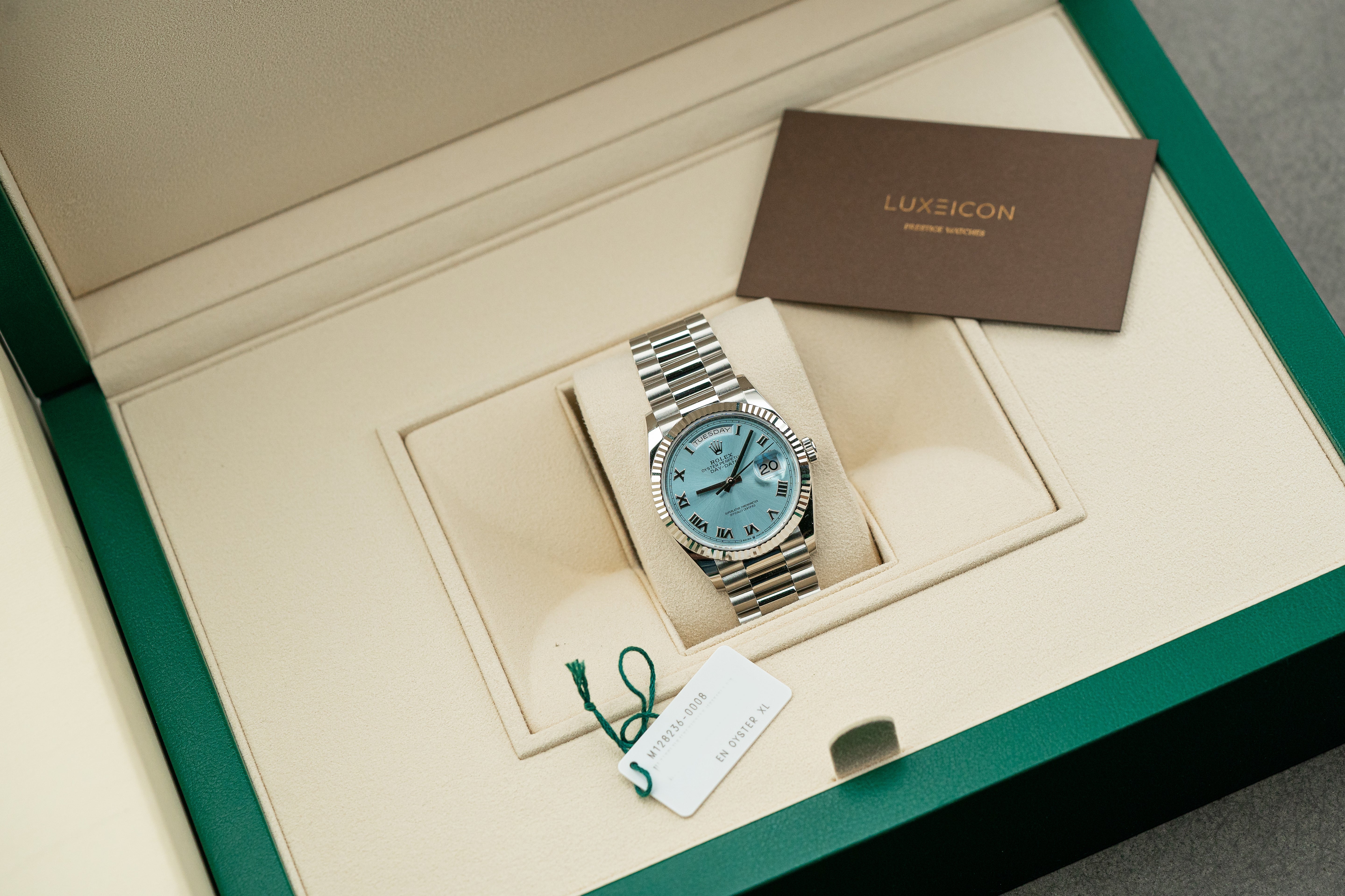 Rolex Day-Date President 128236 36mm Platinum Bracelet Ice Blue Roman Dial
