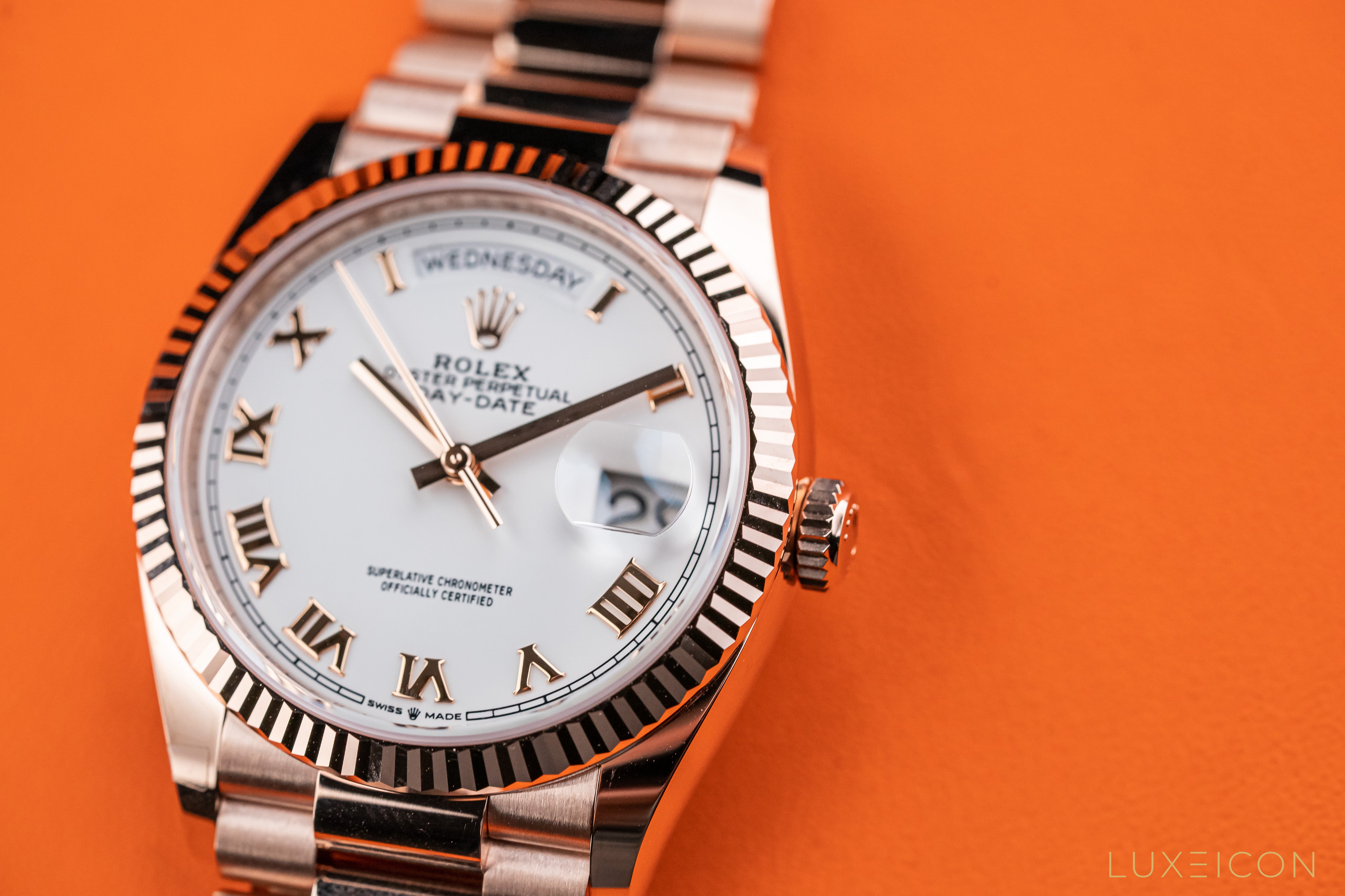Rolex Day-Date 36 Rose Gold White Roman Dial Presidential Bracelet 128235