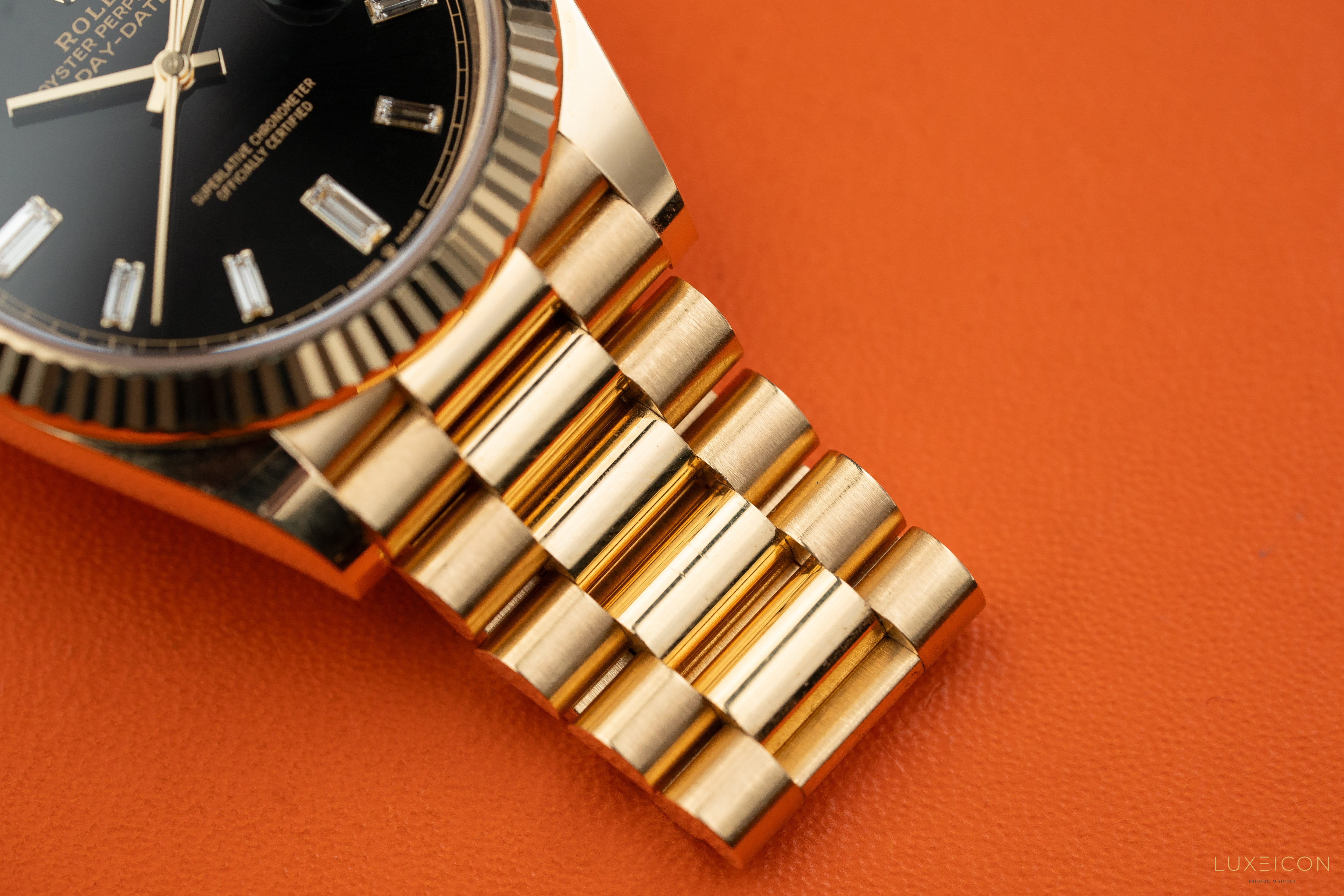 Rolex Day-Date 40mm Yellow Gold Black Diamond Baguette 228238