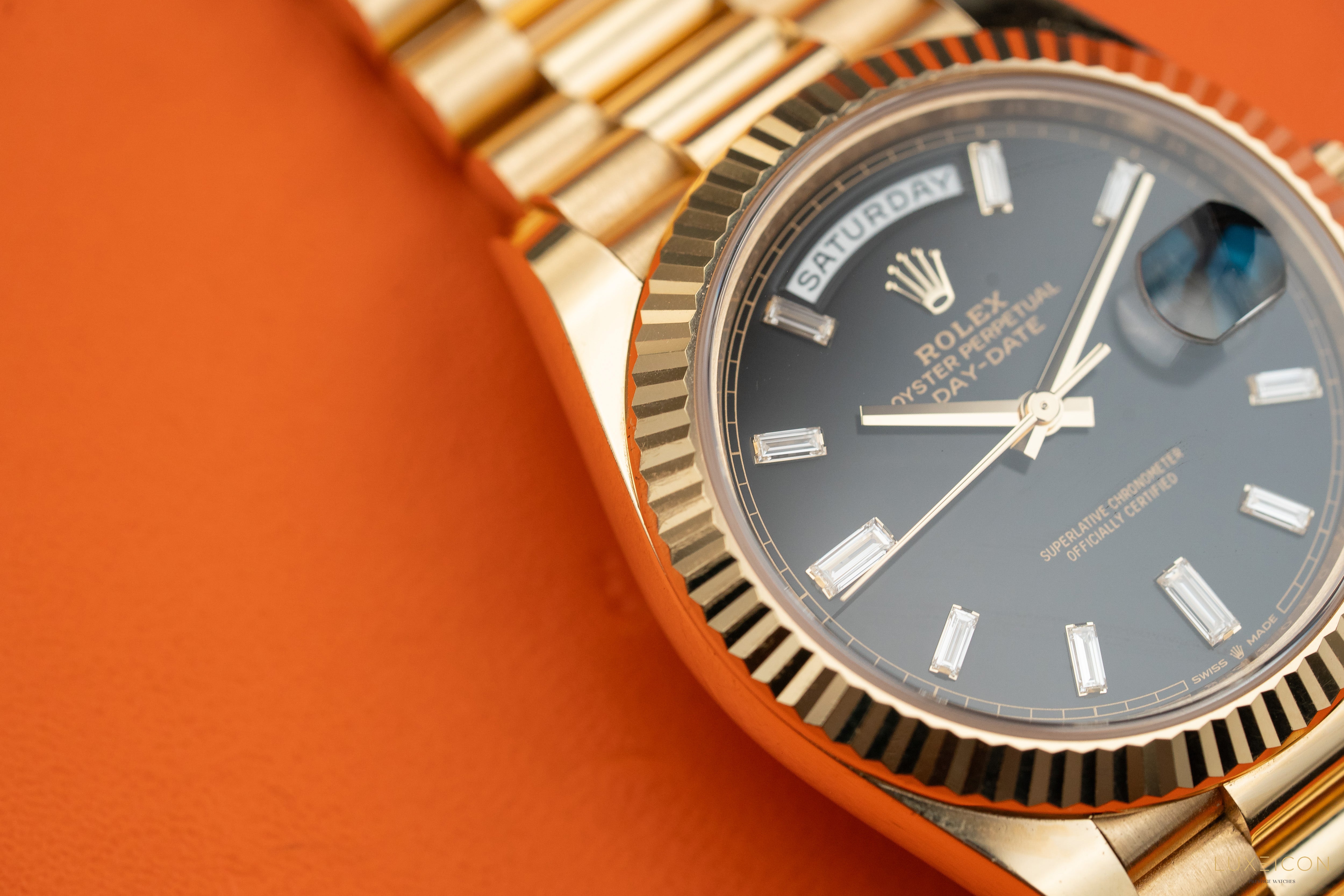 Rolex Day-Date 40mm Yellow Gold Black Diamond Baguette 228238