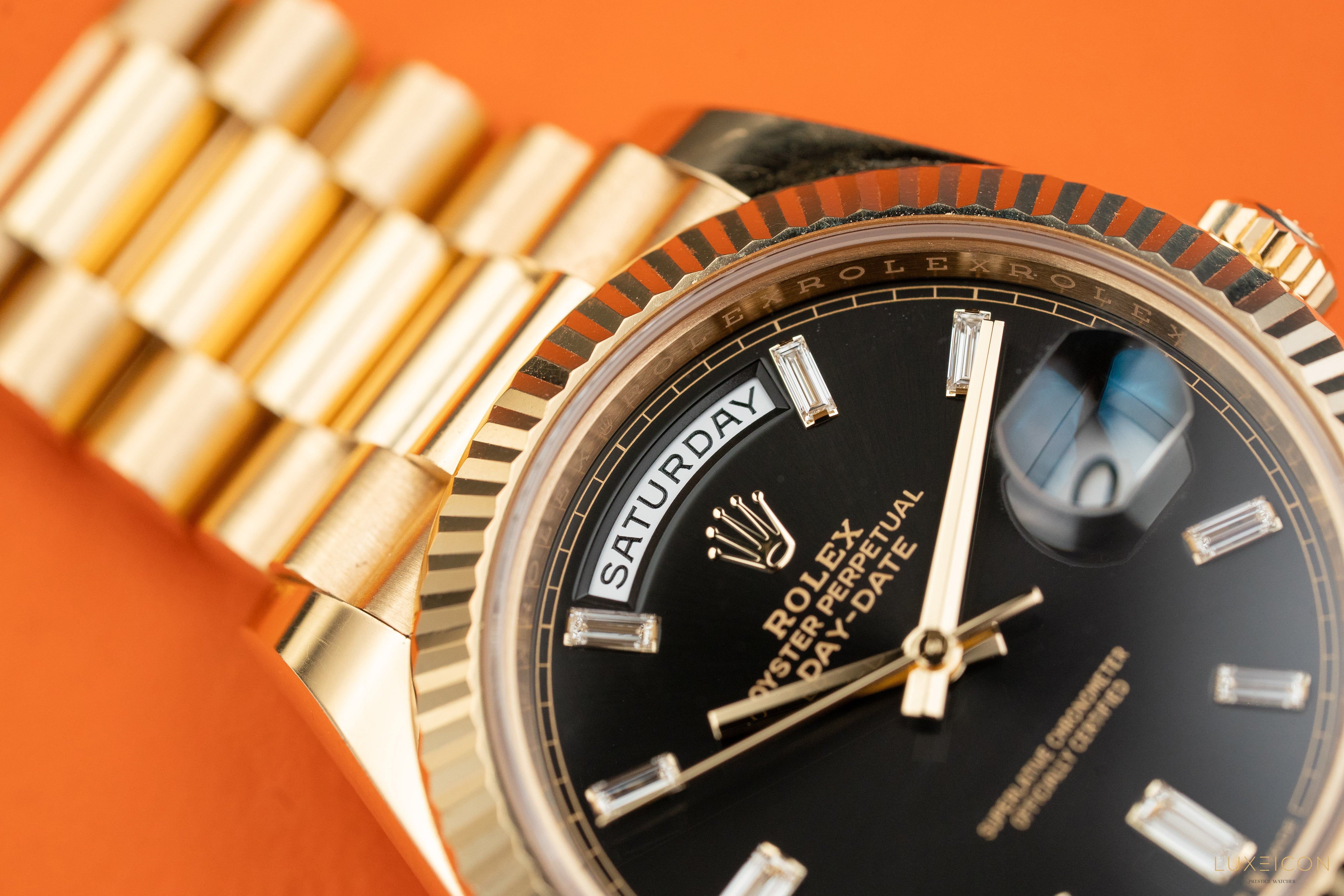 Rolex Day-Date 40mm Yellow Gold Black Diamond Baguette 228238