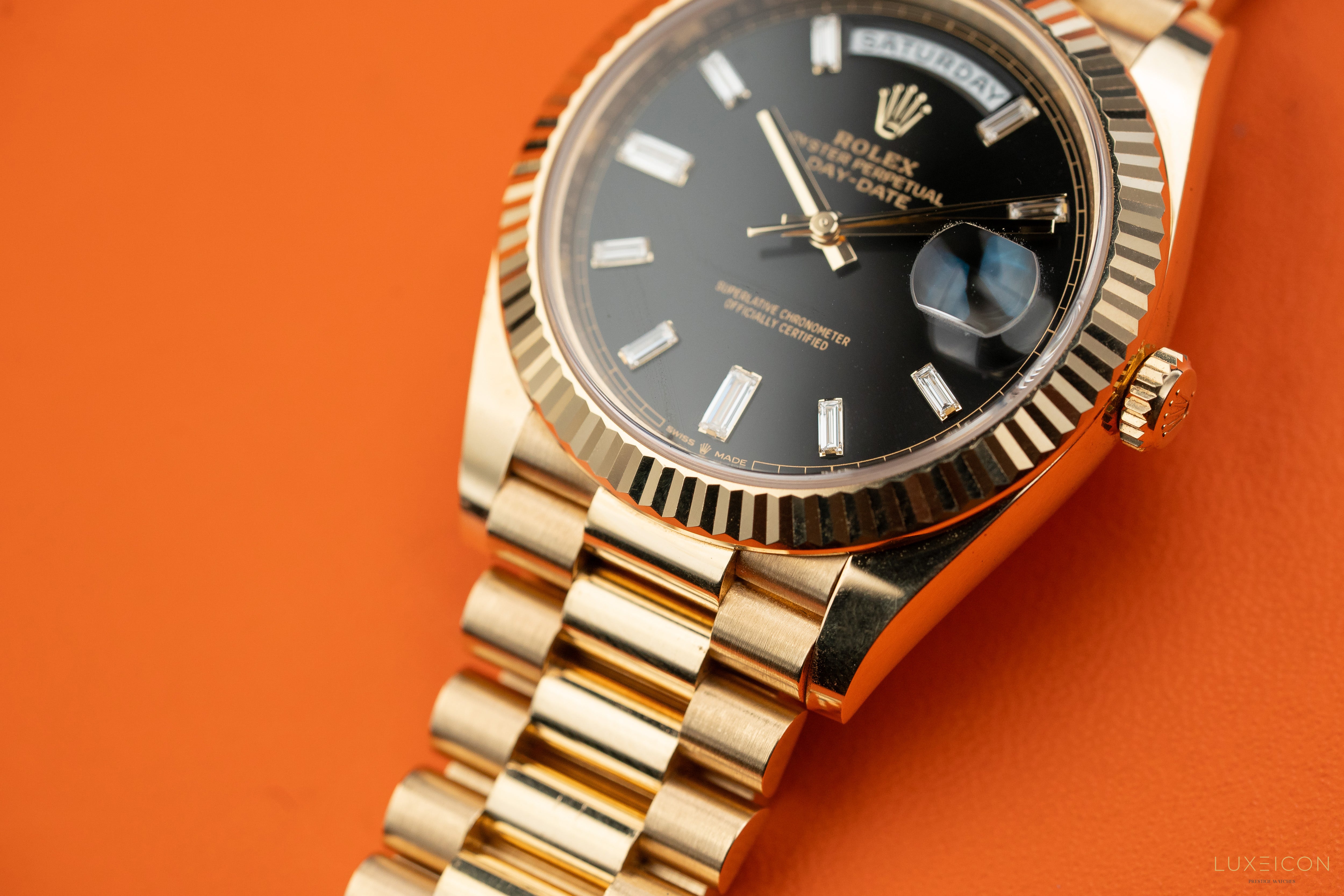 Rolex Day-Date 40mm Yellow Gold Black Diamond Baguette 228238