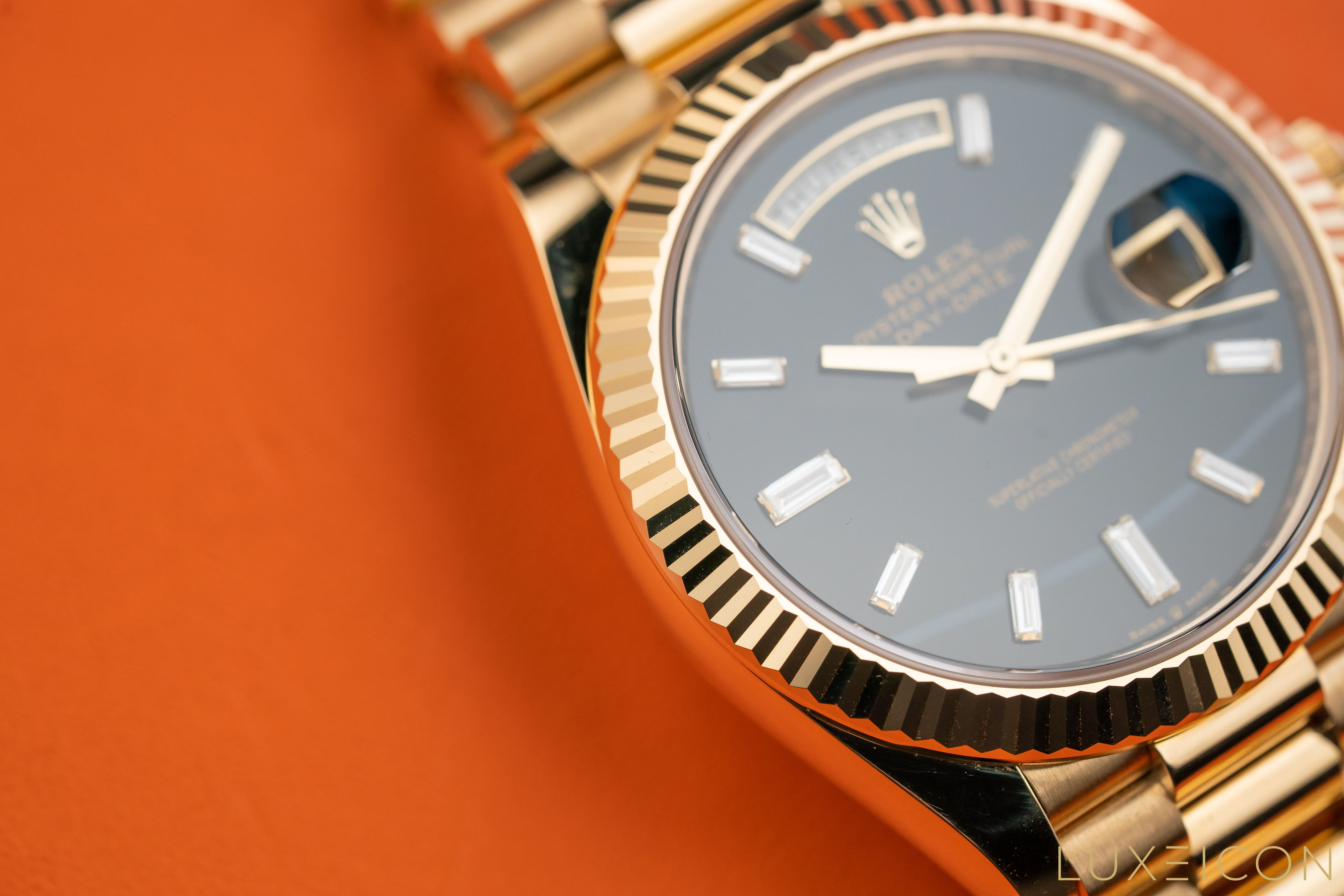 Rolex Day-Date Yellow Gold 40mm Black ONYX Baguette Dial 228238