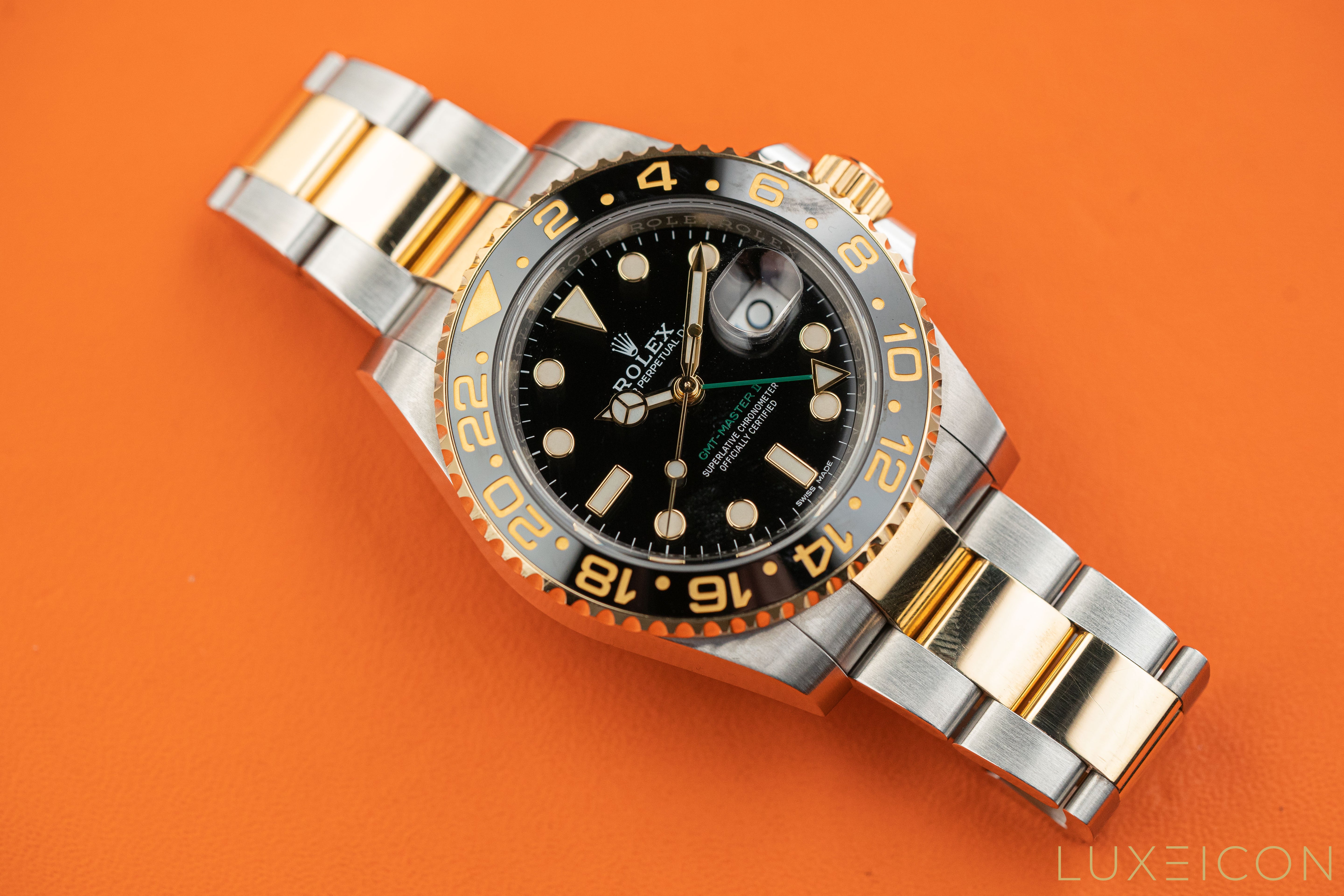 Rolex GMT-Master II Stainless Steel Two Tone Black Dial and Yellow Gold 116713LN