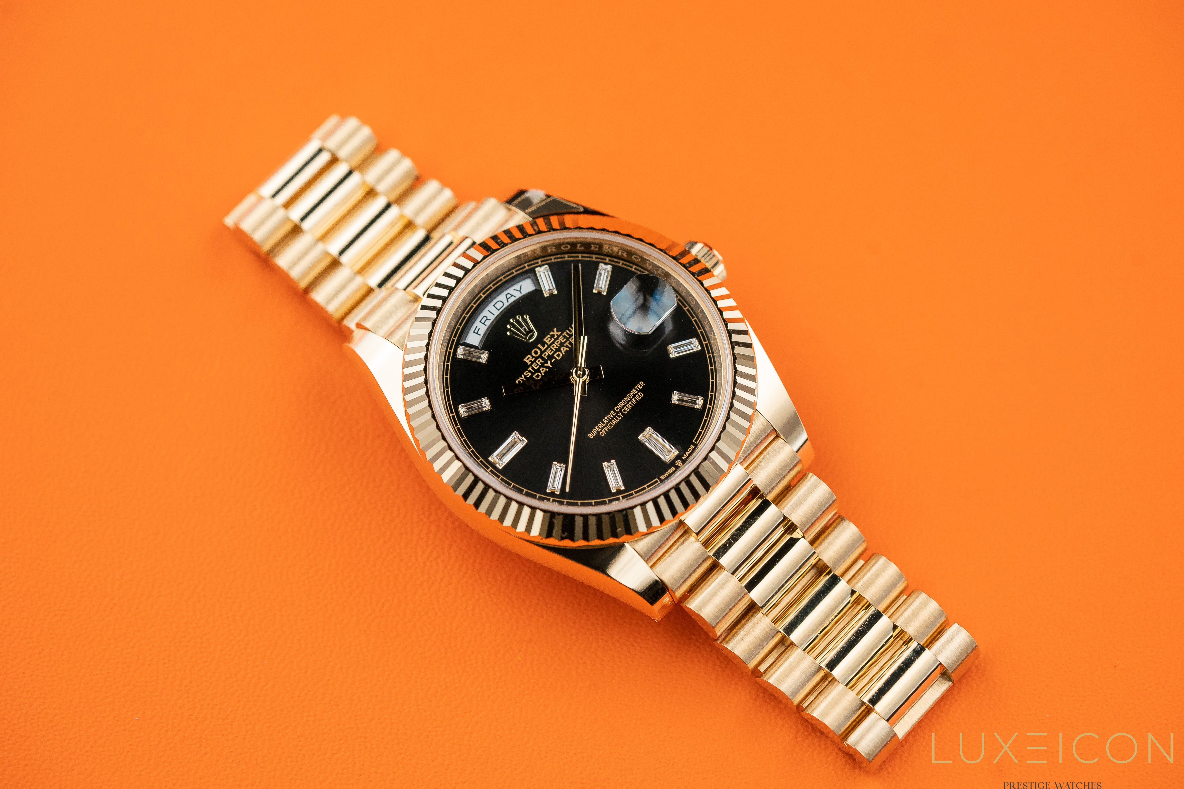 Rolex Day-Date 40 mm Yellow Gold Black Diamond Baguette 228238 2024