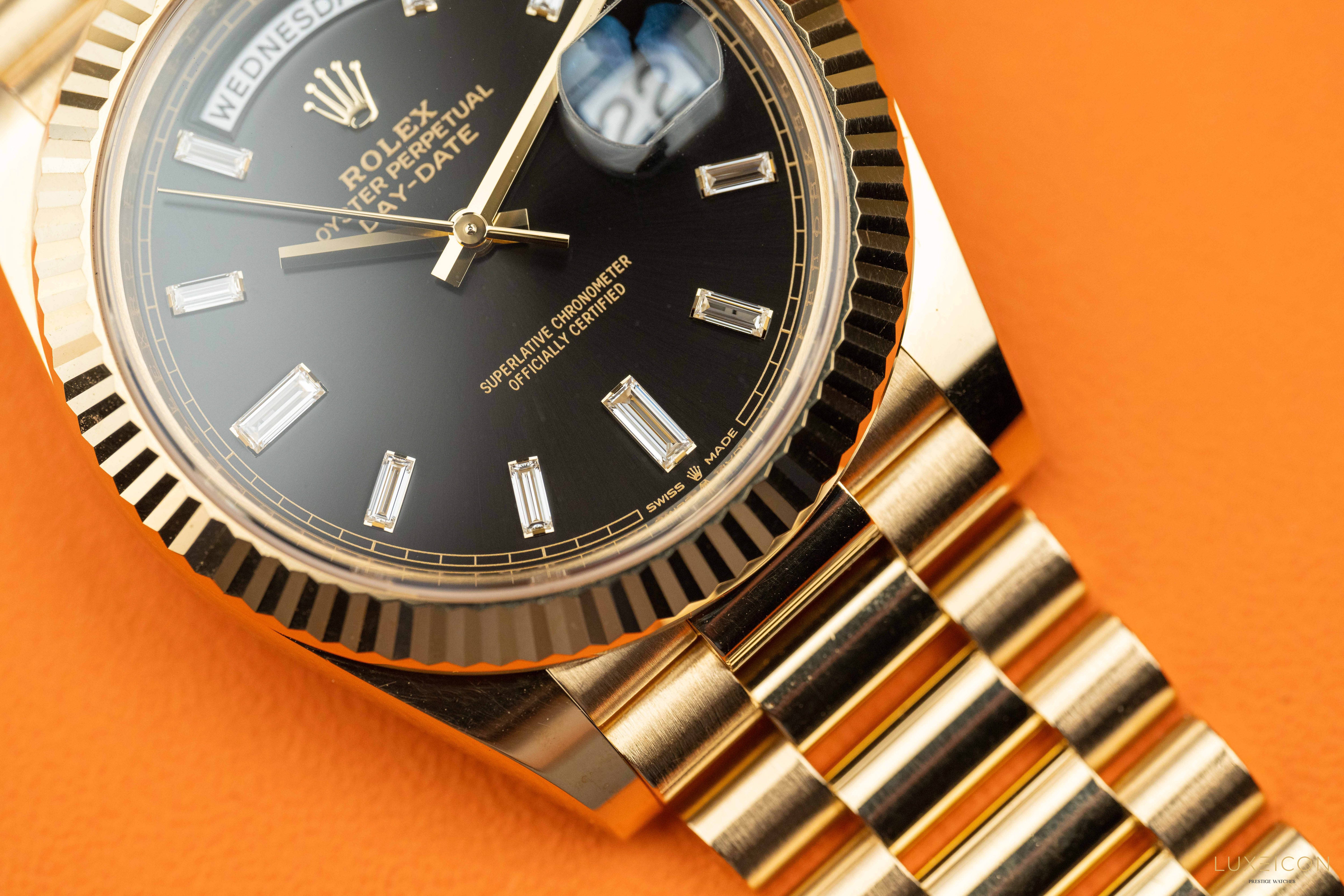 Rolex Day-Date 40 mm Yellow Gold Black Diamond Baguette 228238 2022