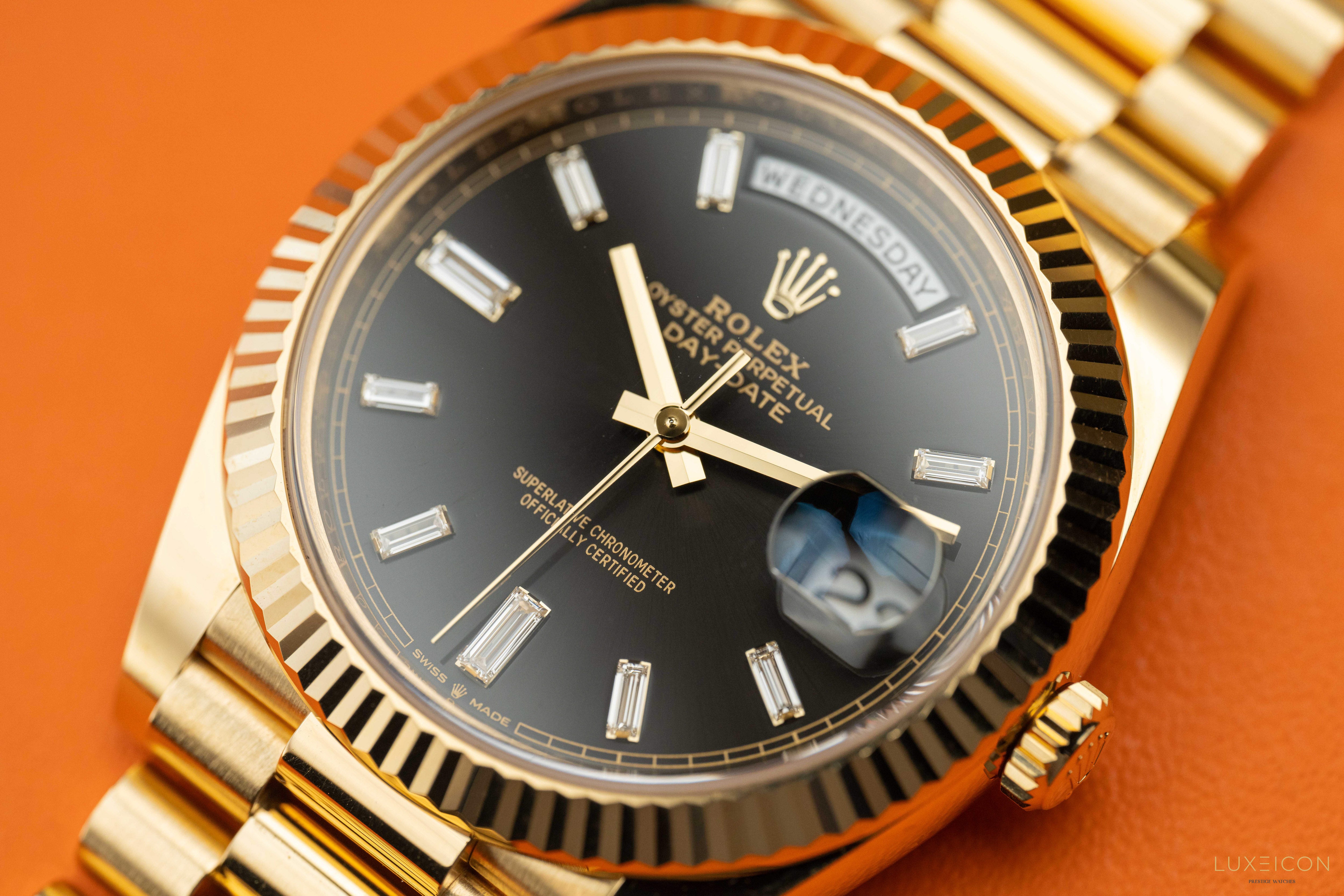 Rolex Day-Date 40 mm Yellow Gold Black Diamond Baguette 228238 2022