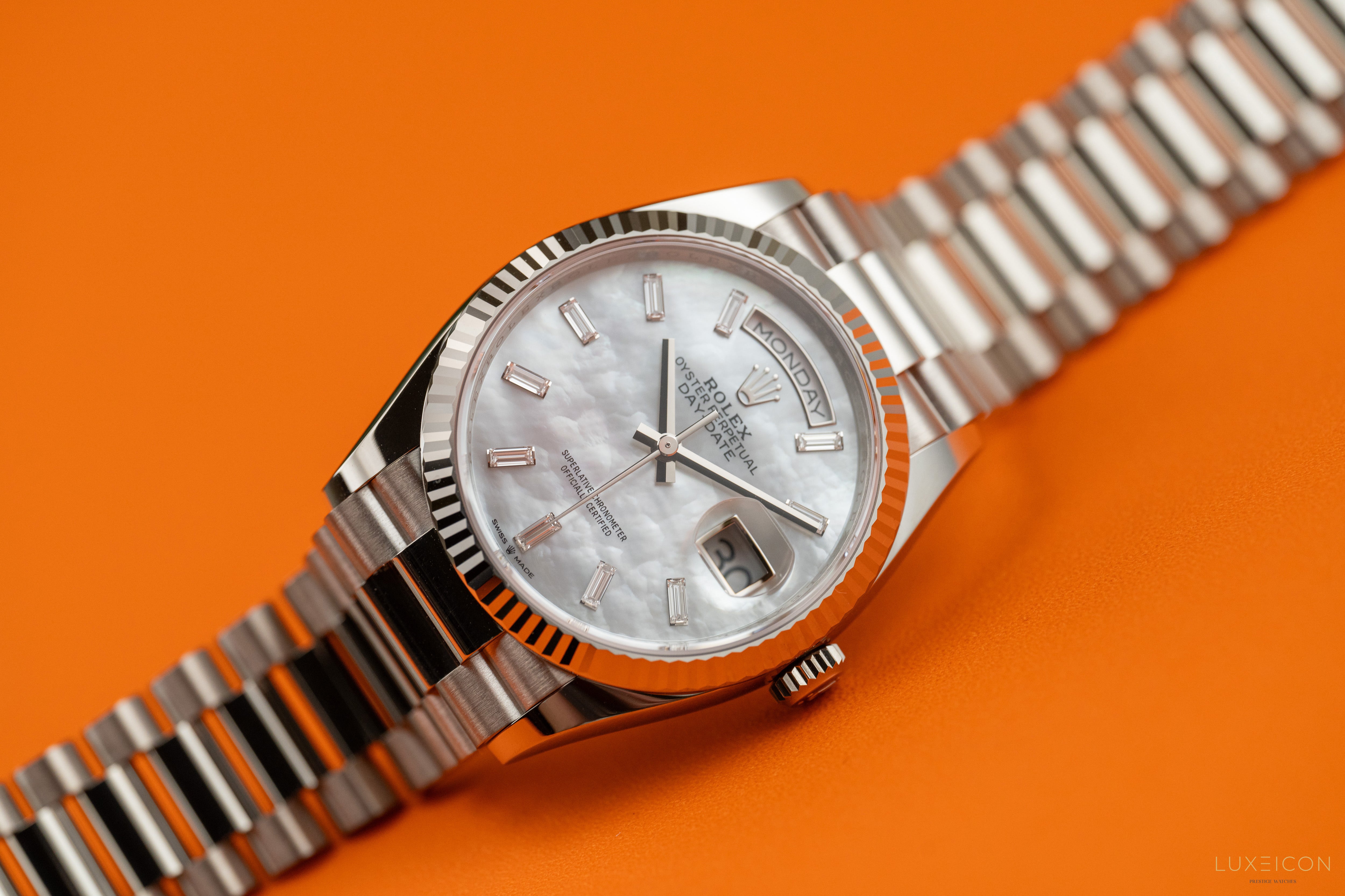 Rolex Day-Date 36mm white gold Mother of Pearl Diamond Baguette Dial 128239