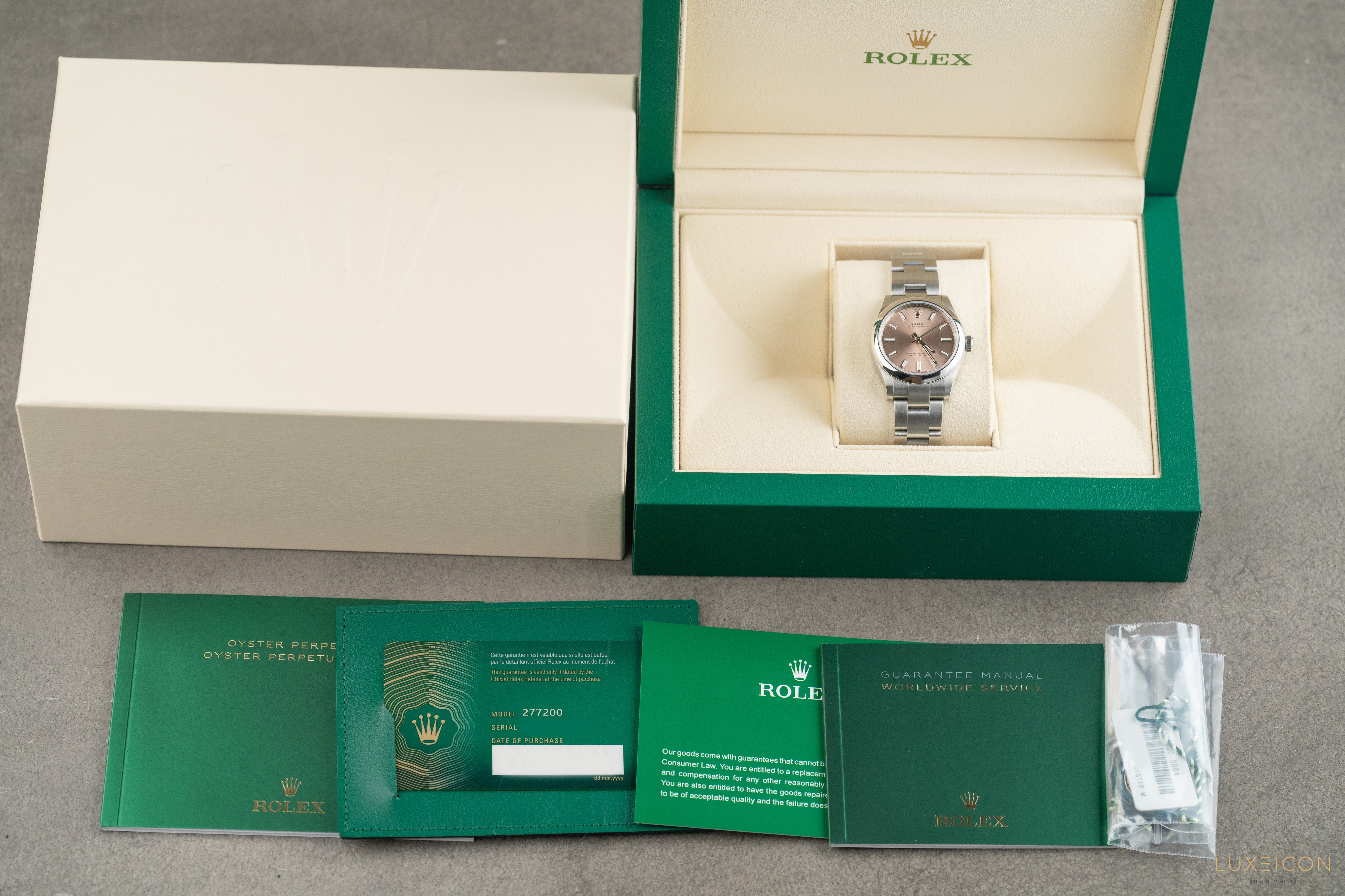 Rolex Oyster Perpetual 31 Pink Index Dial Domed Bezel 277200 2021