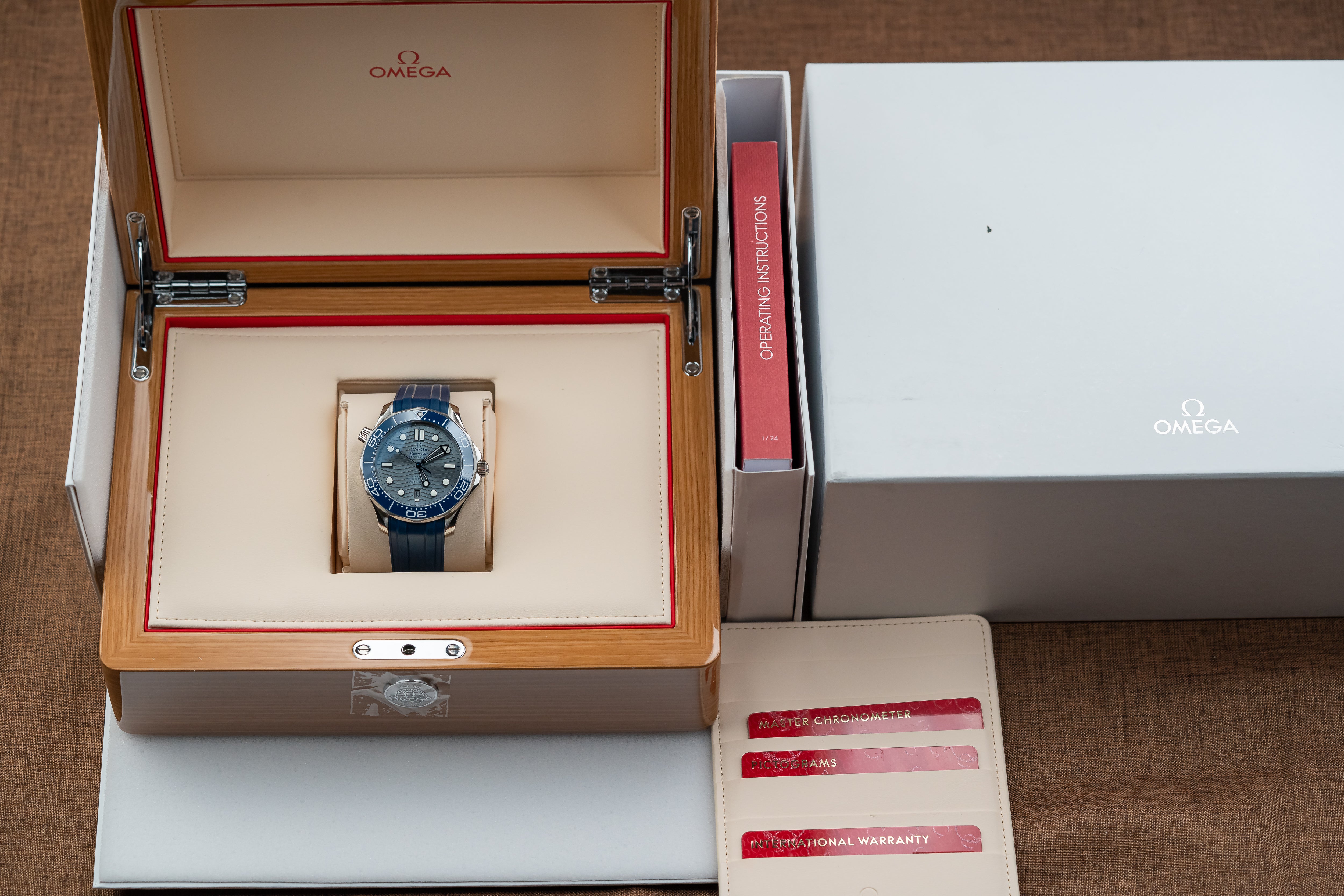 Omega Seamaster Diver 300M Co-axial Master Chronometer blue dial Full Set 2021 Unworn