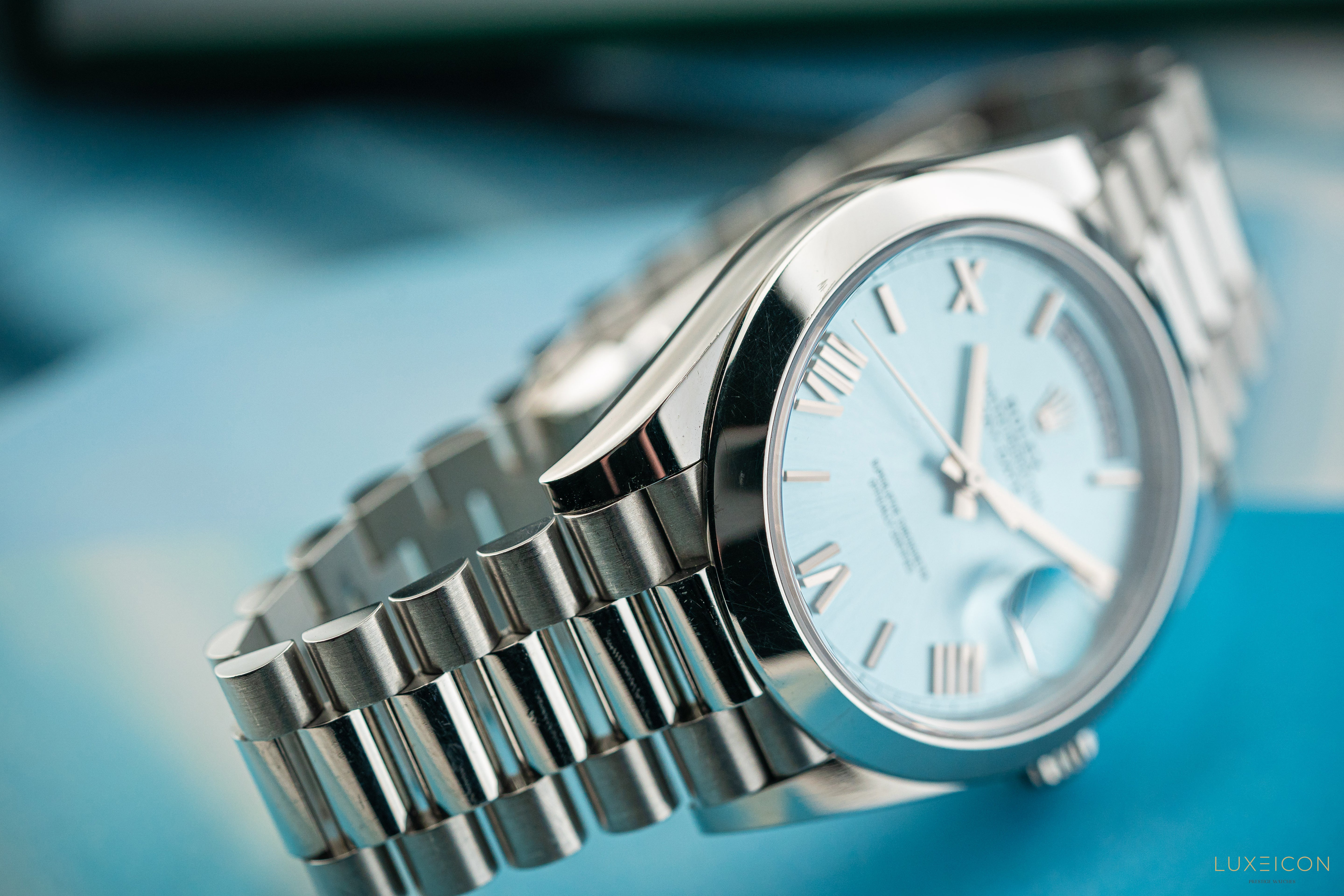 Rolex Day-Date 40 228206 Platinum President Ice Blue Silver Roman Dial