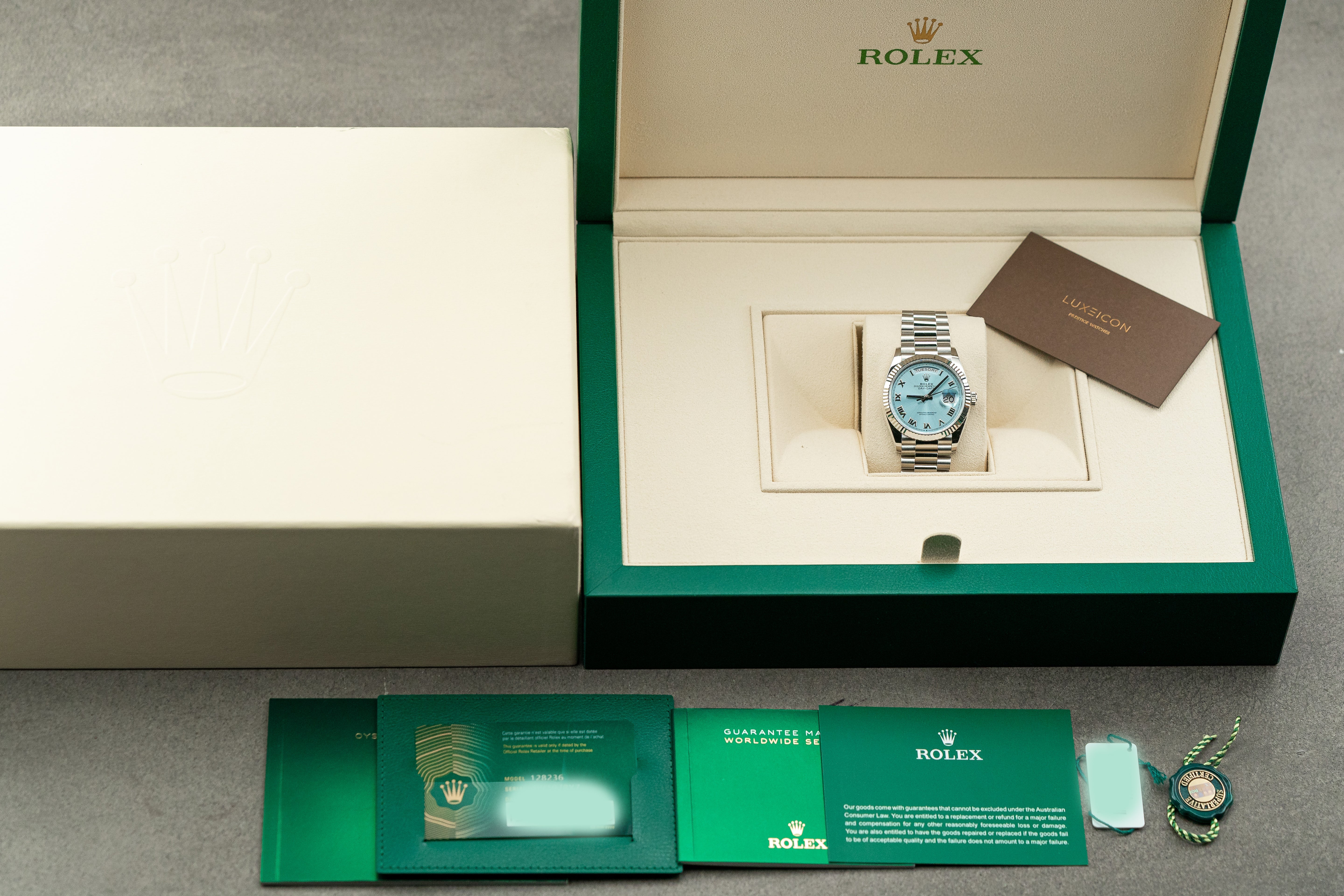 Rolex Day-Date President 128236 36mm Platinum Bracelet Ice Blue Roman Dial