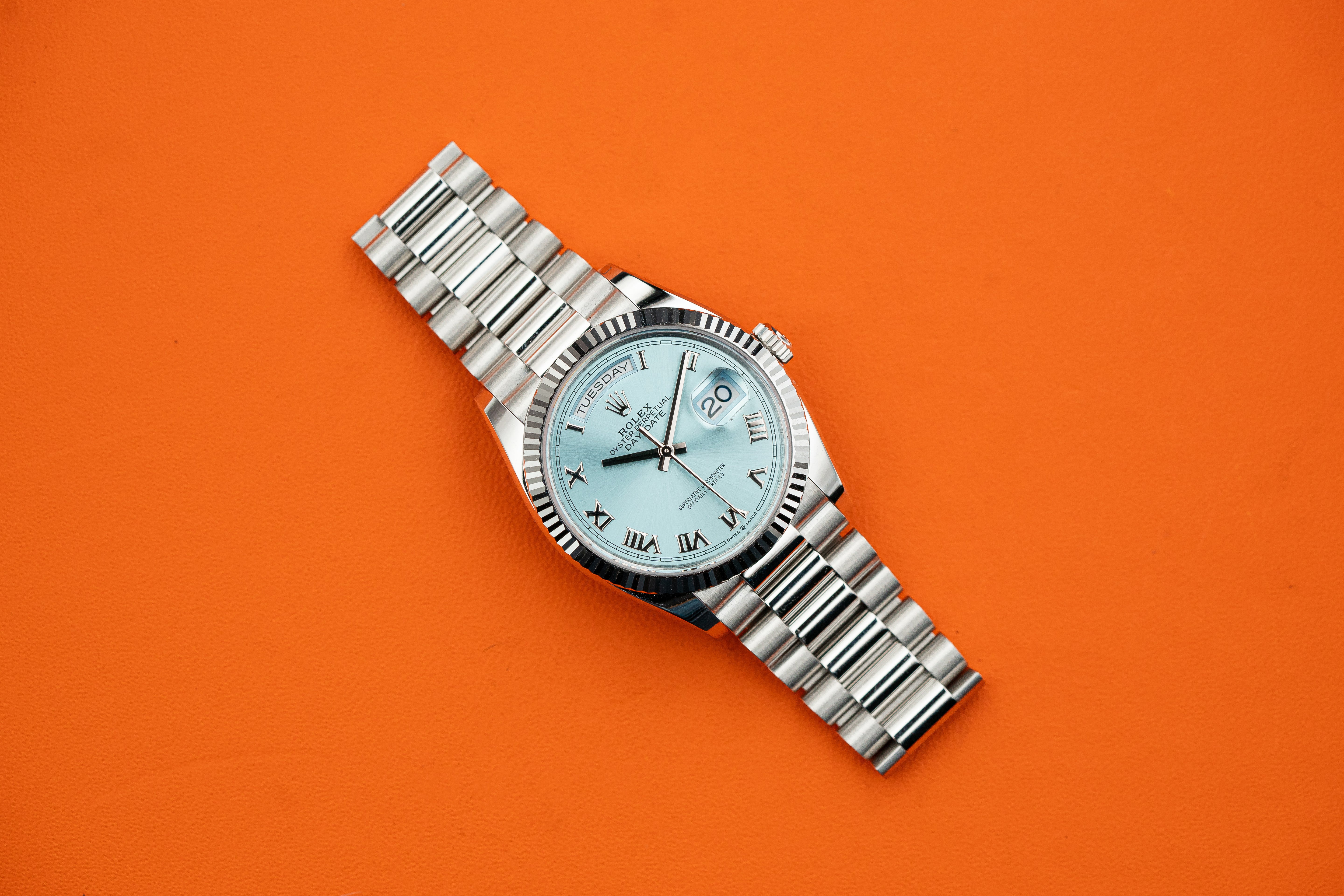 Rolex Day-Date President 128236 36mm Platinum Bracelet Ice Blue Roman Dial