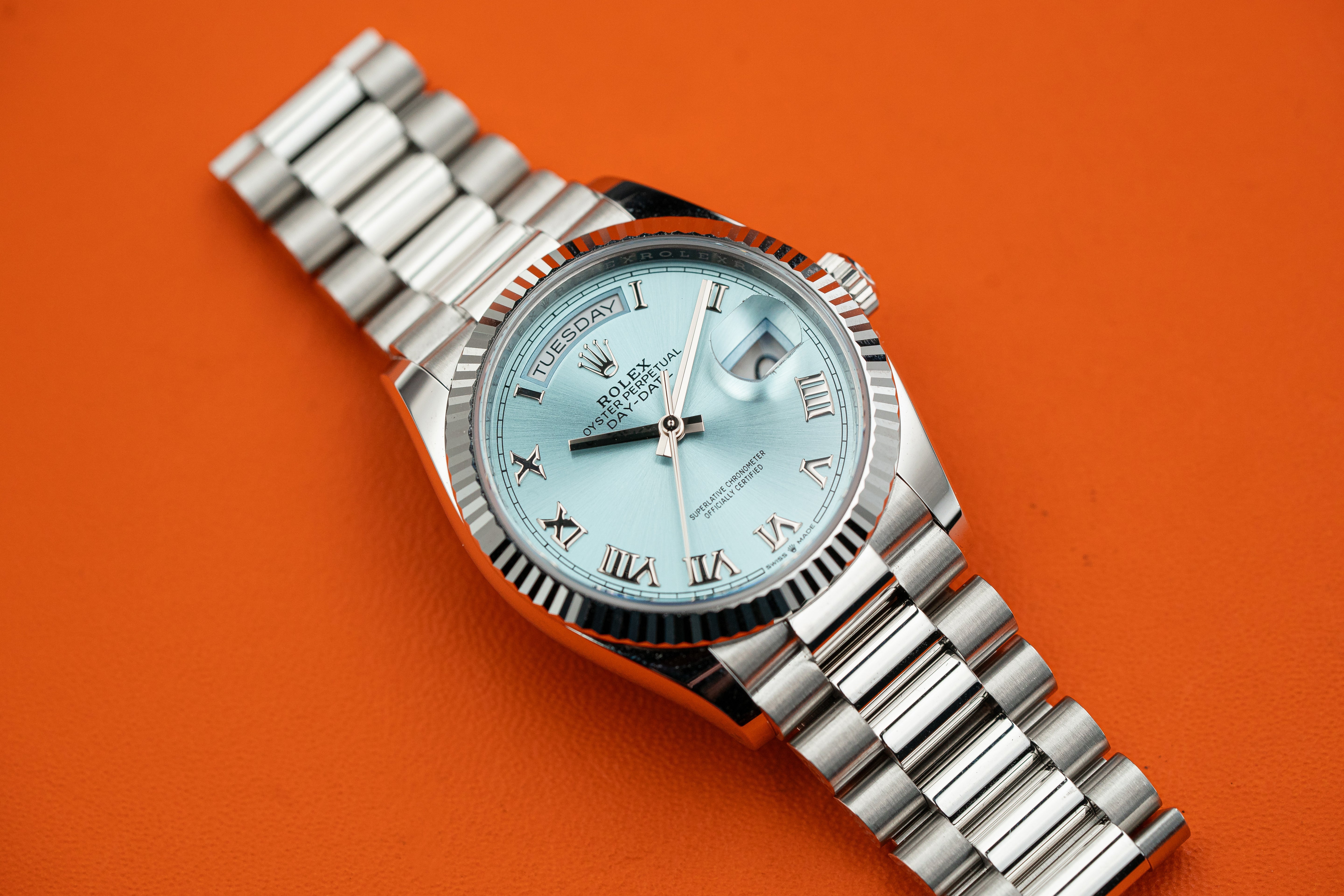 Rolex Day-Date President 128236 36mm Platinum Bracelet Ice Blue Roman Dial Unworn