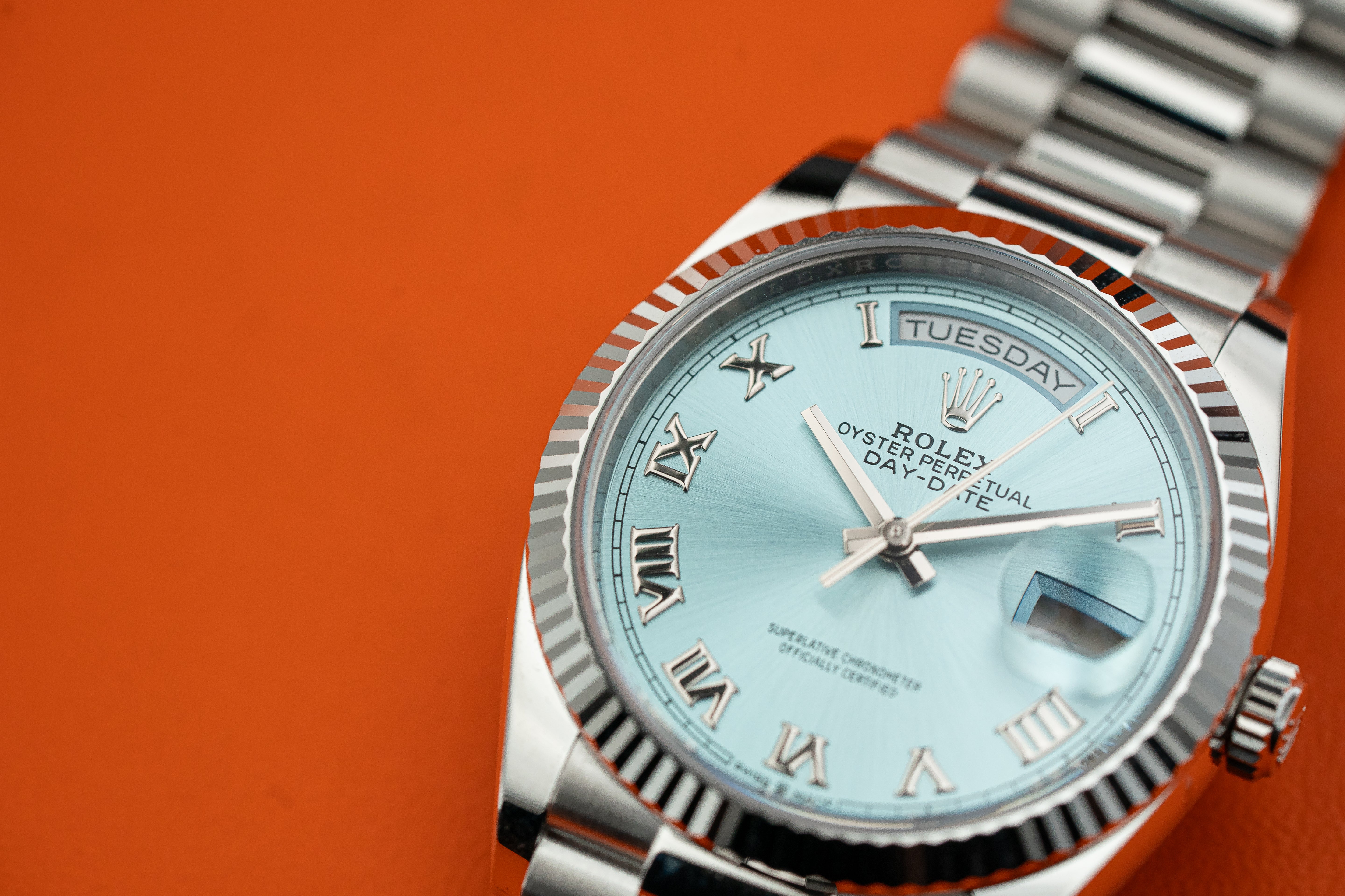 Rolex Day-Date President 128236 36mm Platinum Bracelet Ice Blue Roman Dial