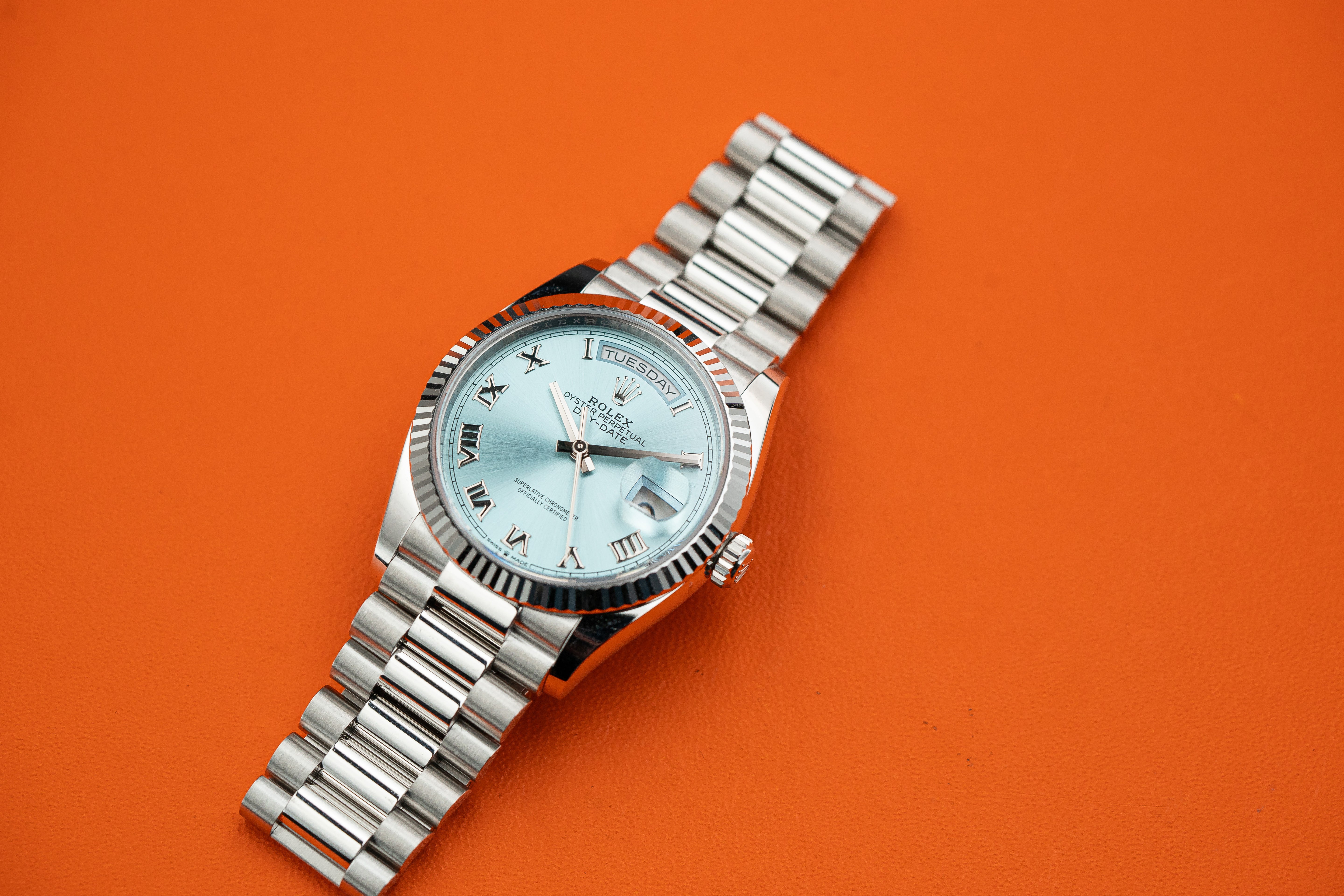 Rolex Day-Date President 128236 36mm Platinum Bracelet Ice Blue Roman Dial