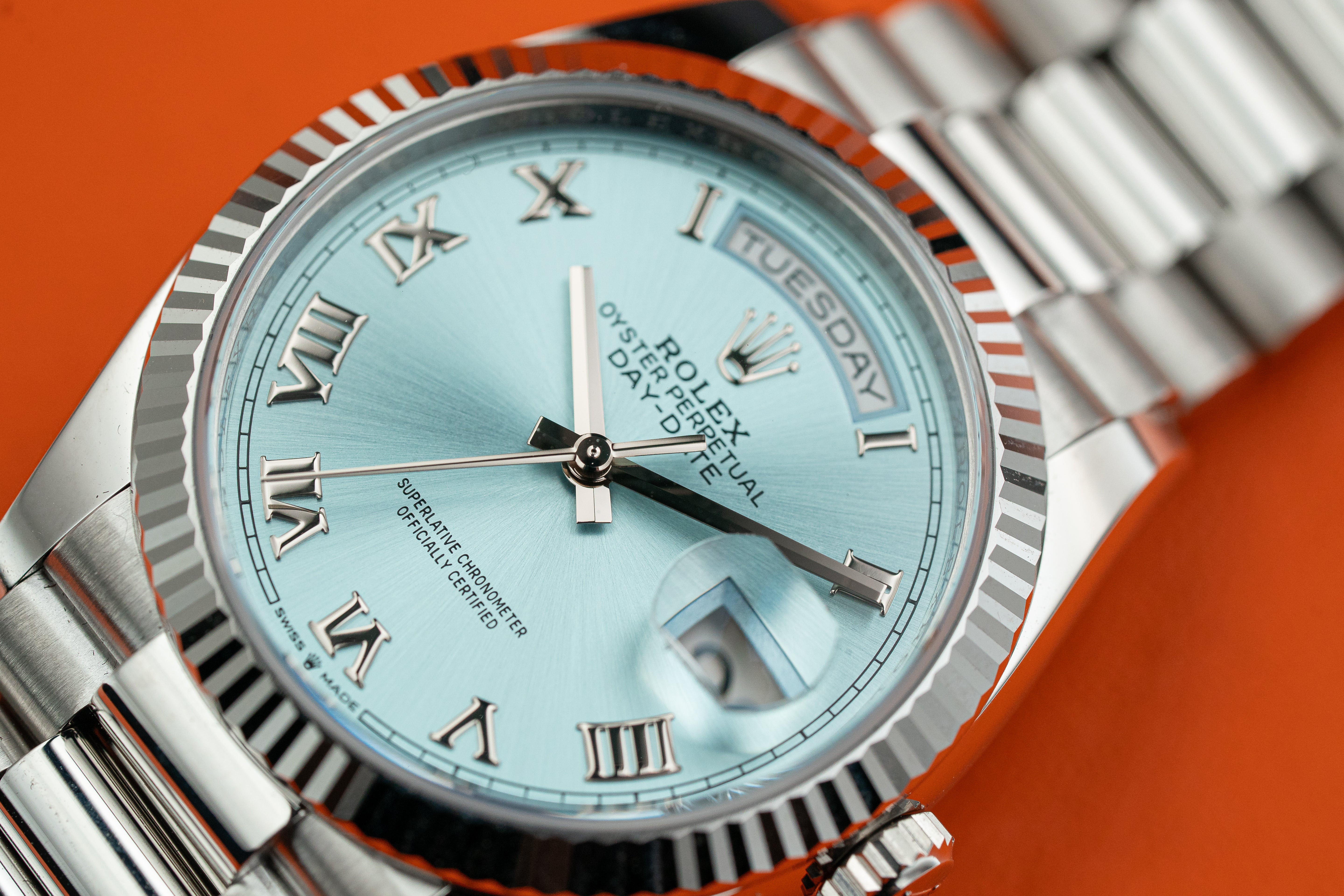 Rolex Day-Date President 128236 36mm Platinum Bracelet Ice Blue Roman Dial