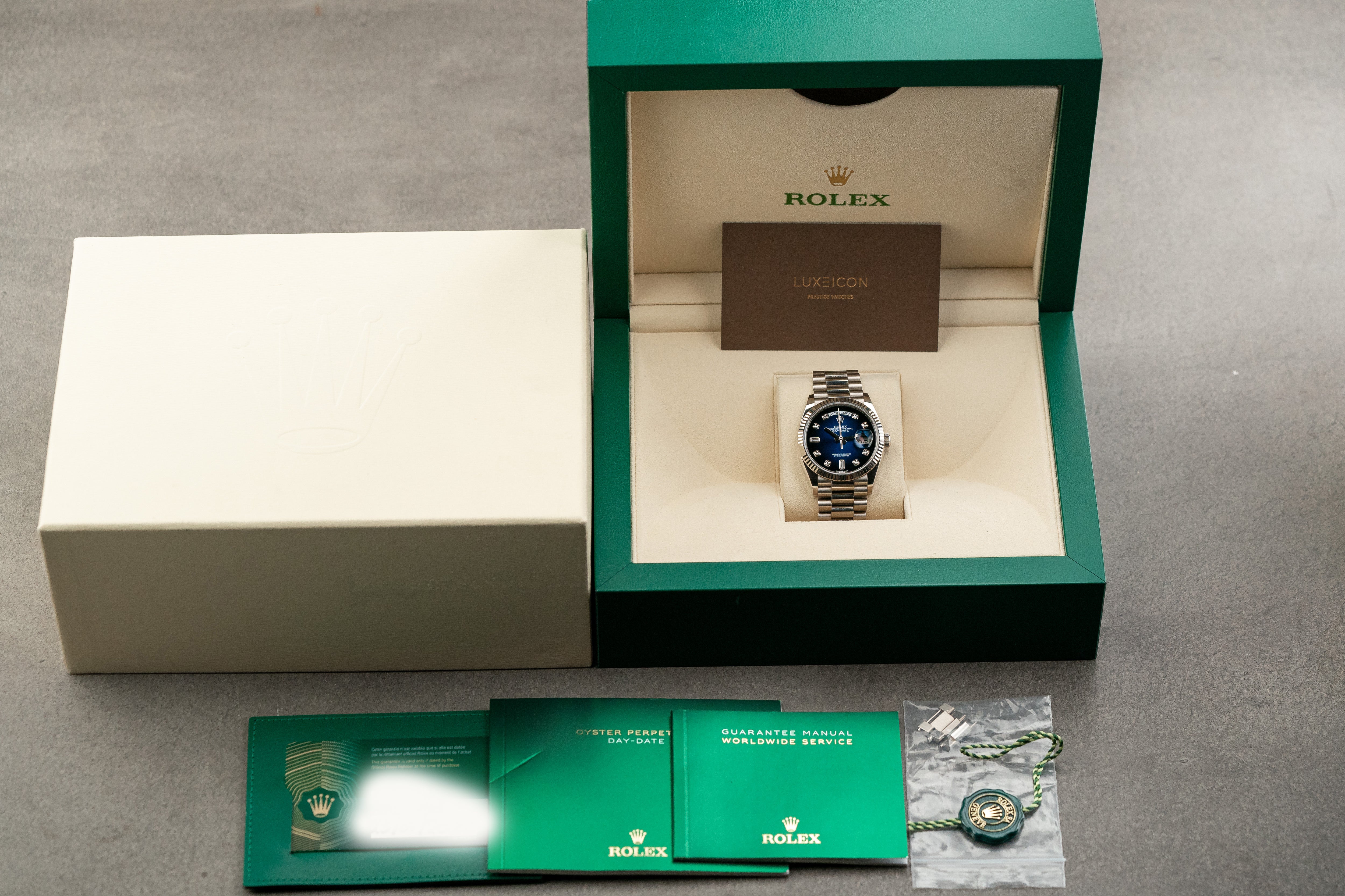 Rolex Day-Date White Gold Presidential 36mm Fluted Bezel Blue Ombre Diamond Dial 128239