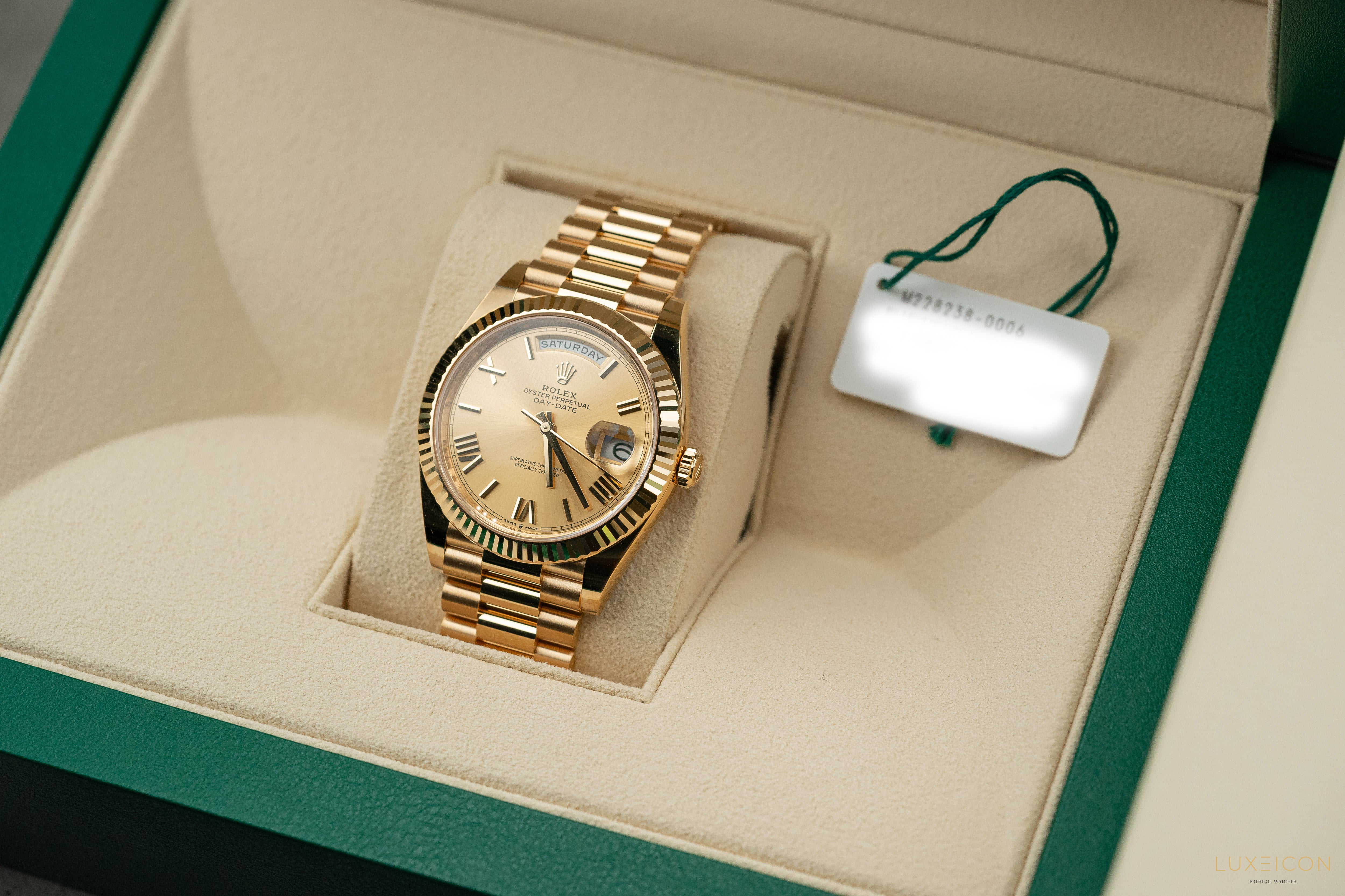 Rolex Day-Date 228238 40mm Champagne Gold Roman Dial President Bracelet Yellow Gold Fluted Bezel