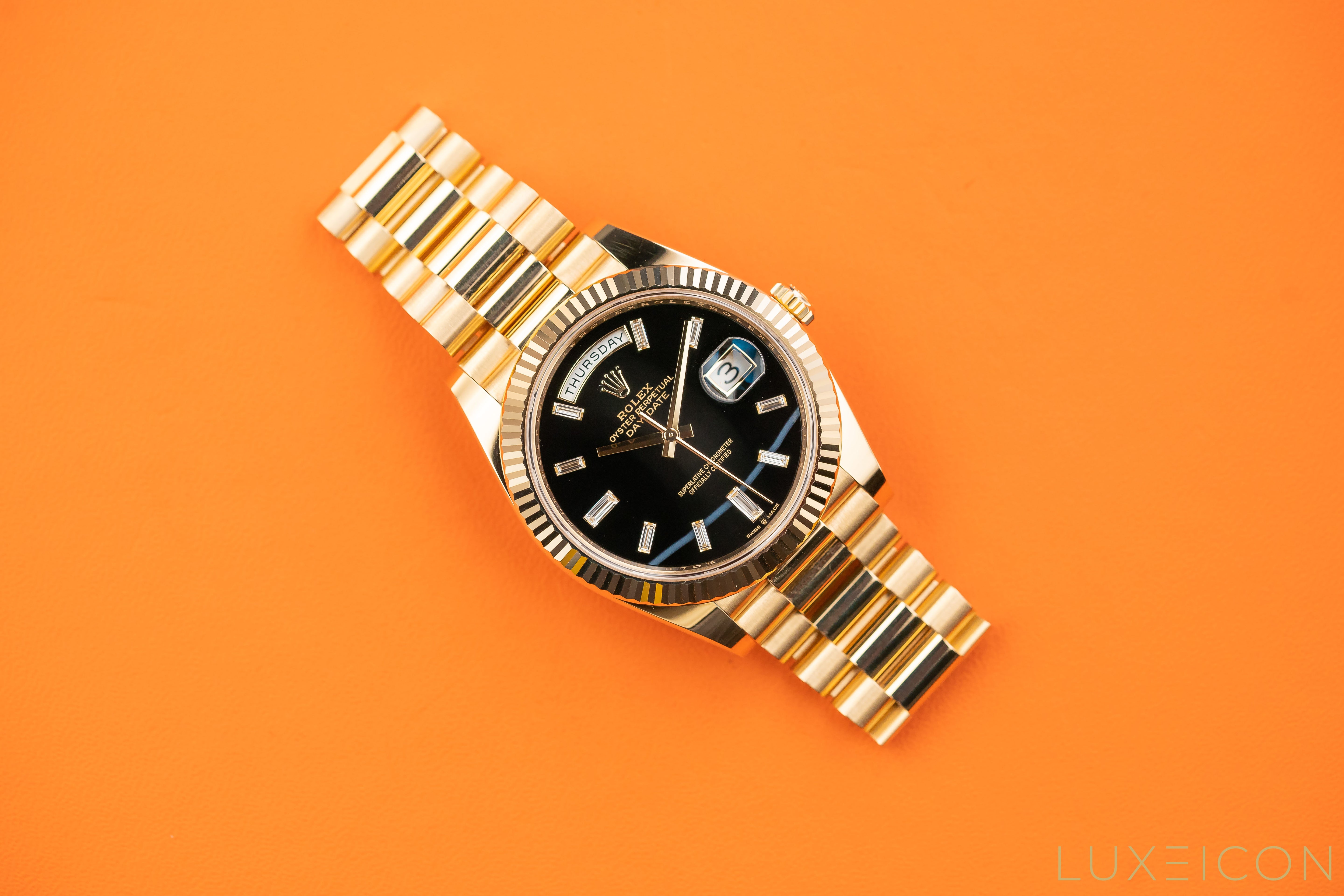 Rolex Day-Date Yellow Gold 40mm Black ONYX Baguette Dial 228238