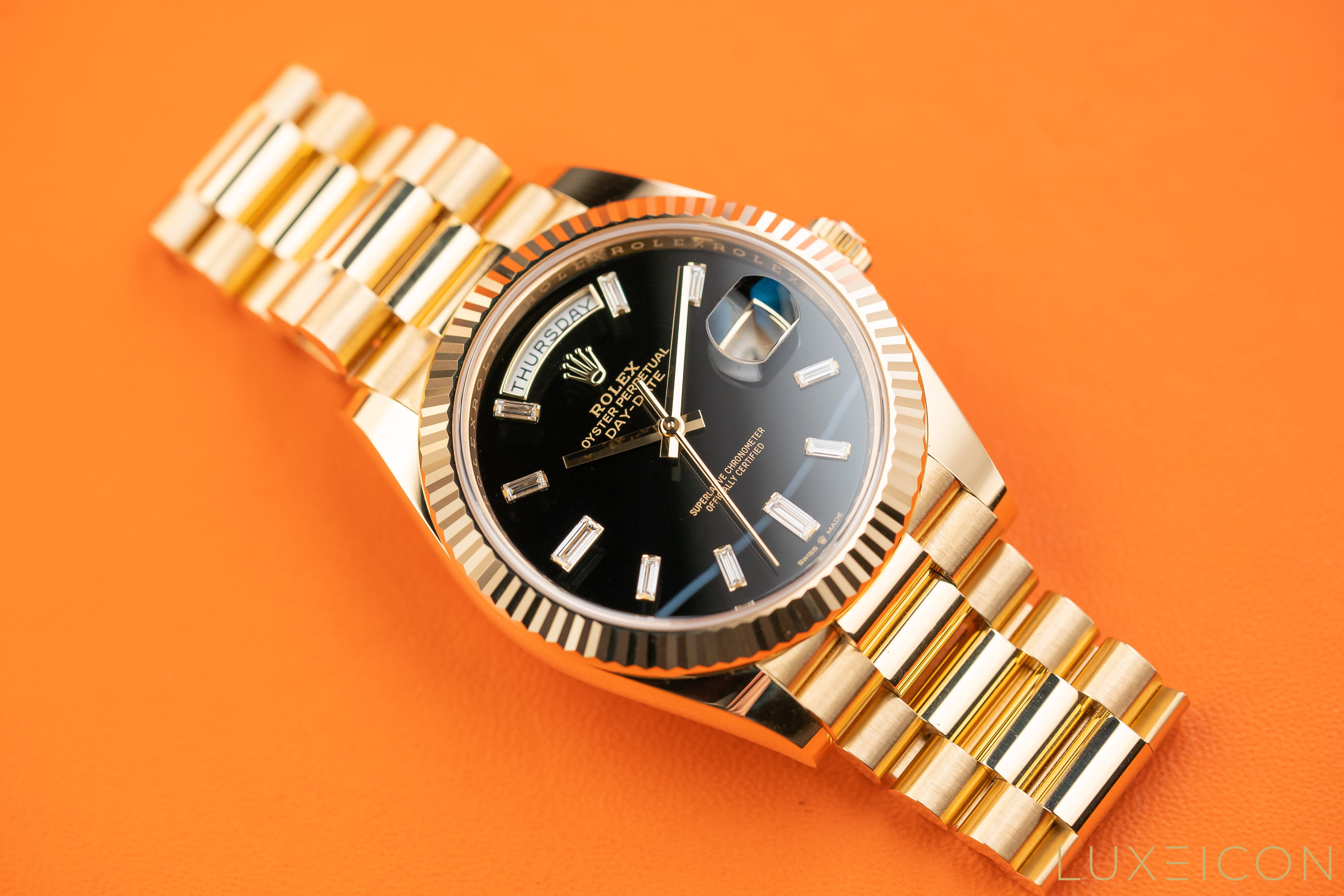 Rolex Day-Date Yellow Gold 40mm Black ONYX Baguette Dial 228238