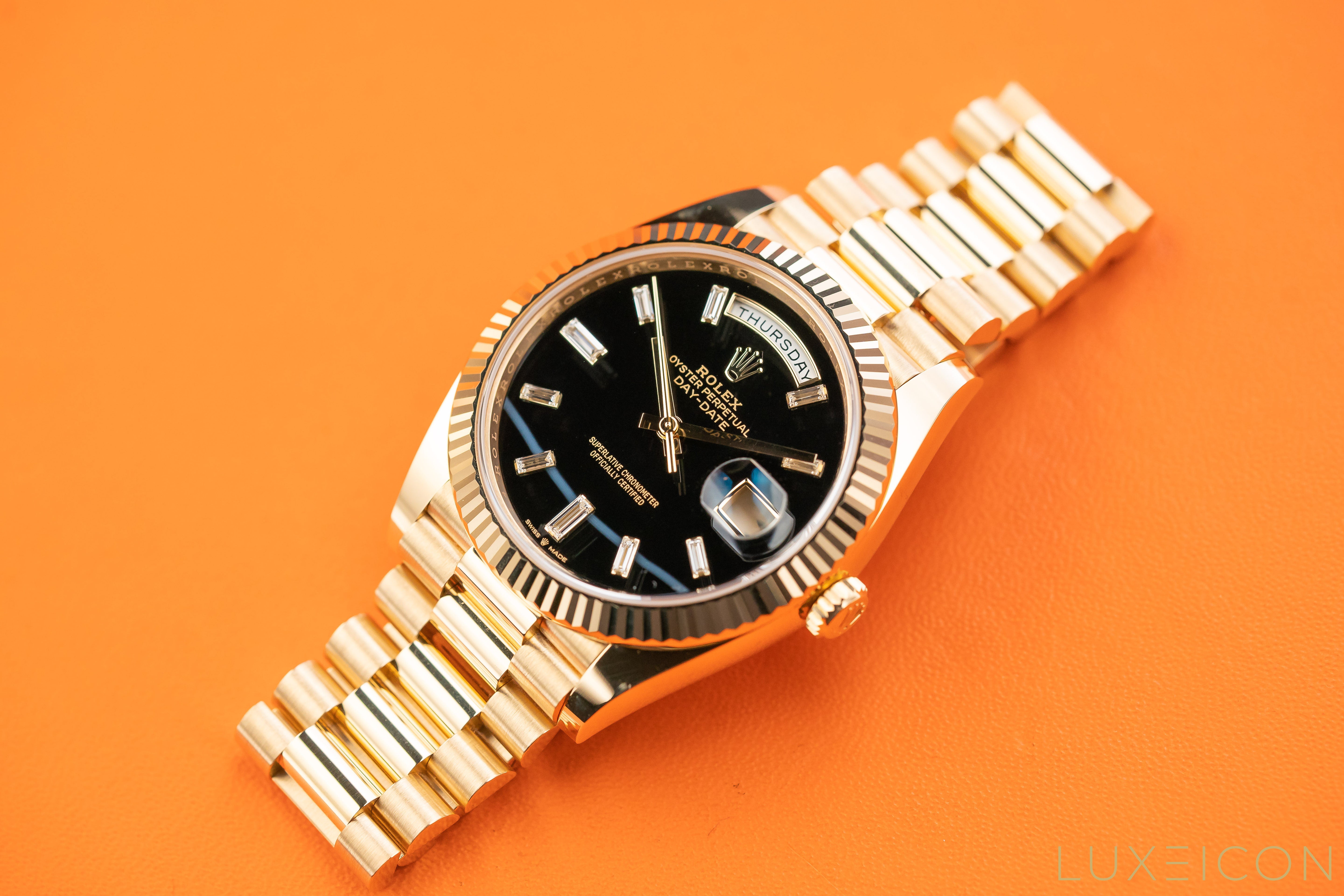 Rolex Day-Date Yellow Gold 40mm Black ONYX Baguette Dial 228238