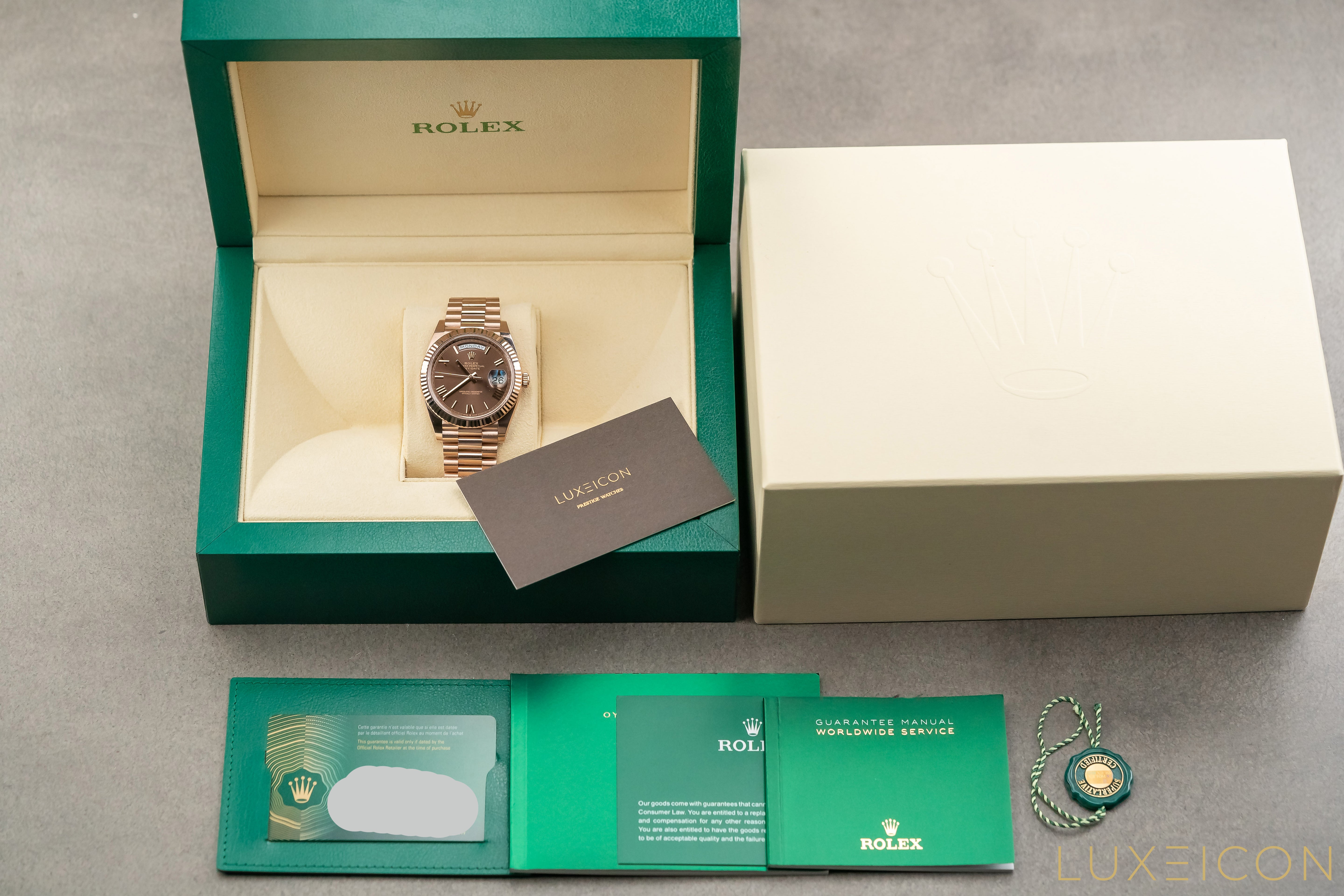 Rolex Day-Date 40mm Rose Gold Chocolate Roman Dial Fluted Bezel 228235