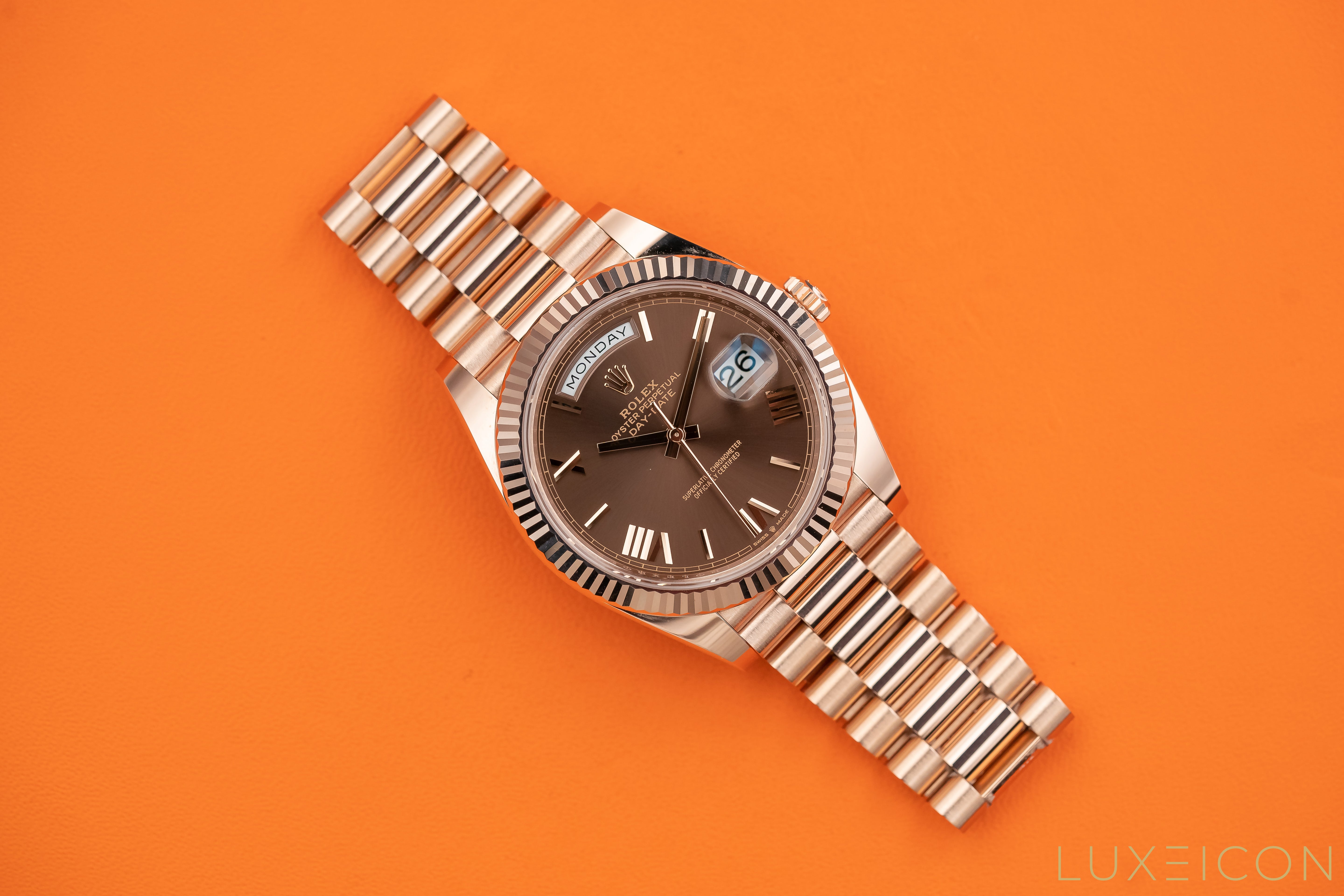 Rolex Day-Date 40mm Rose Gold Chocolate Roman Dial Fluted Bezel 228235