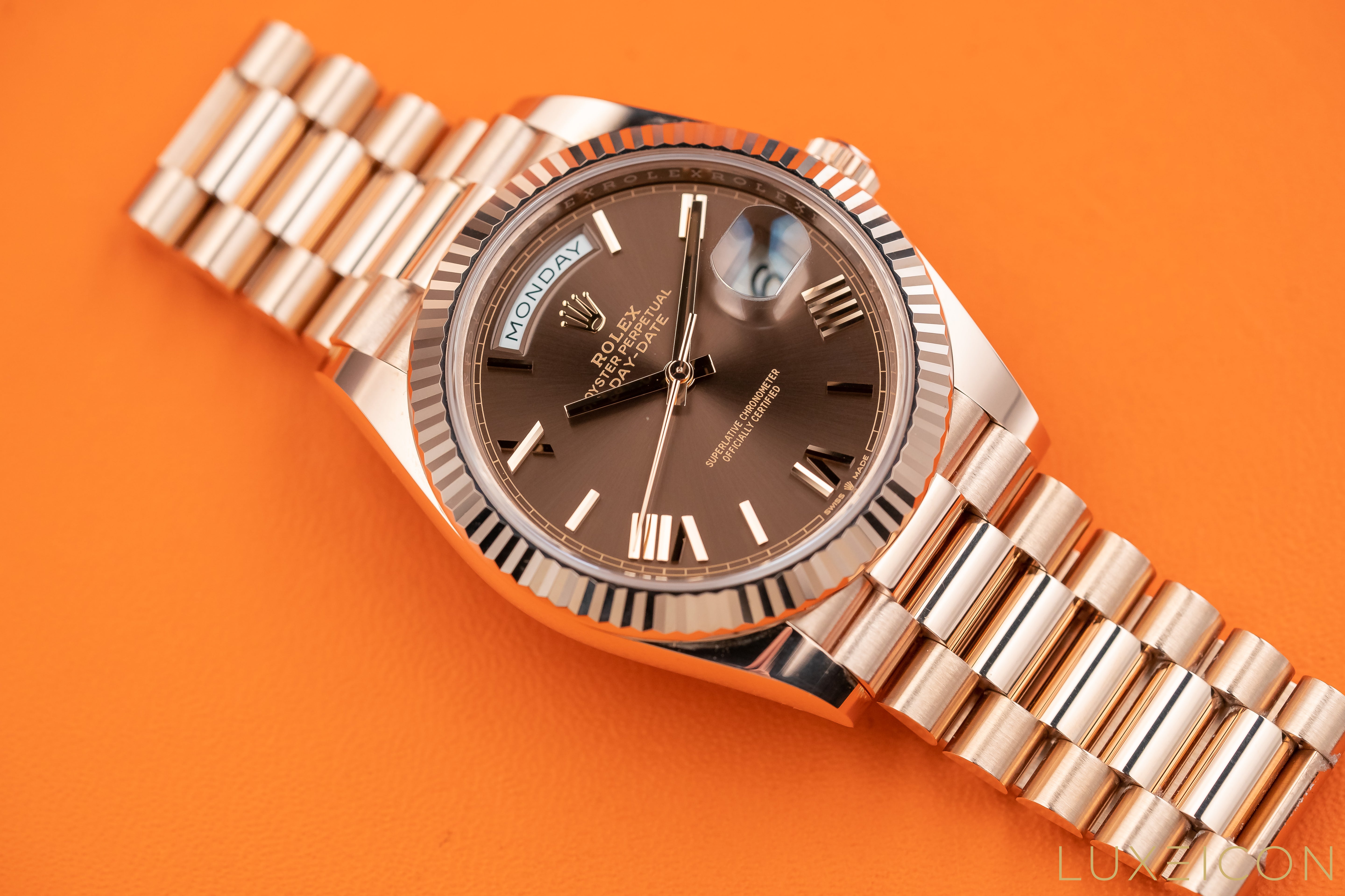 Rolex Day-Date 40mm Rose Gold Chocolate Roman Dial Fluted Bezel 228235