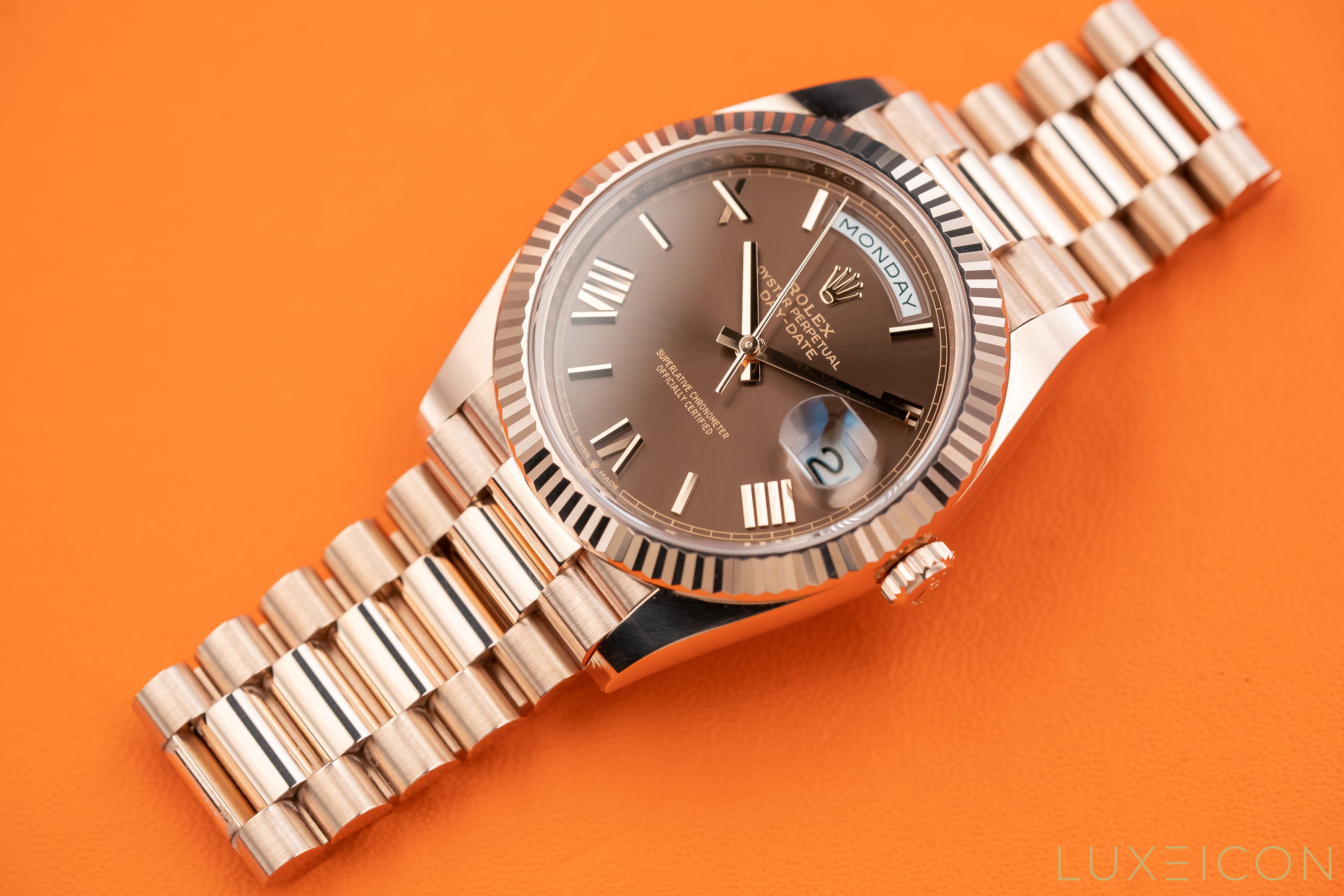 Rolex Day-Date 40mm Rose Gold Chocolate Roman Dial Fluted Bezel 228235