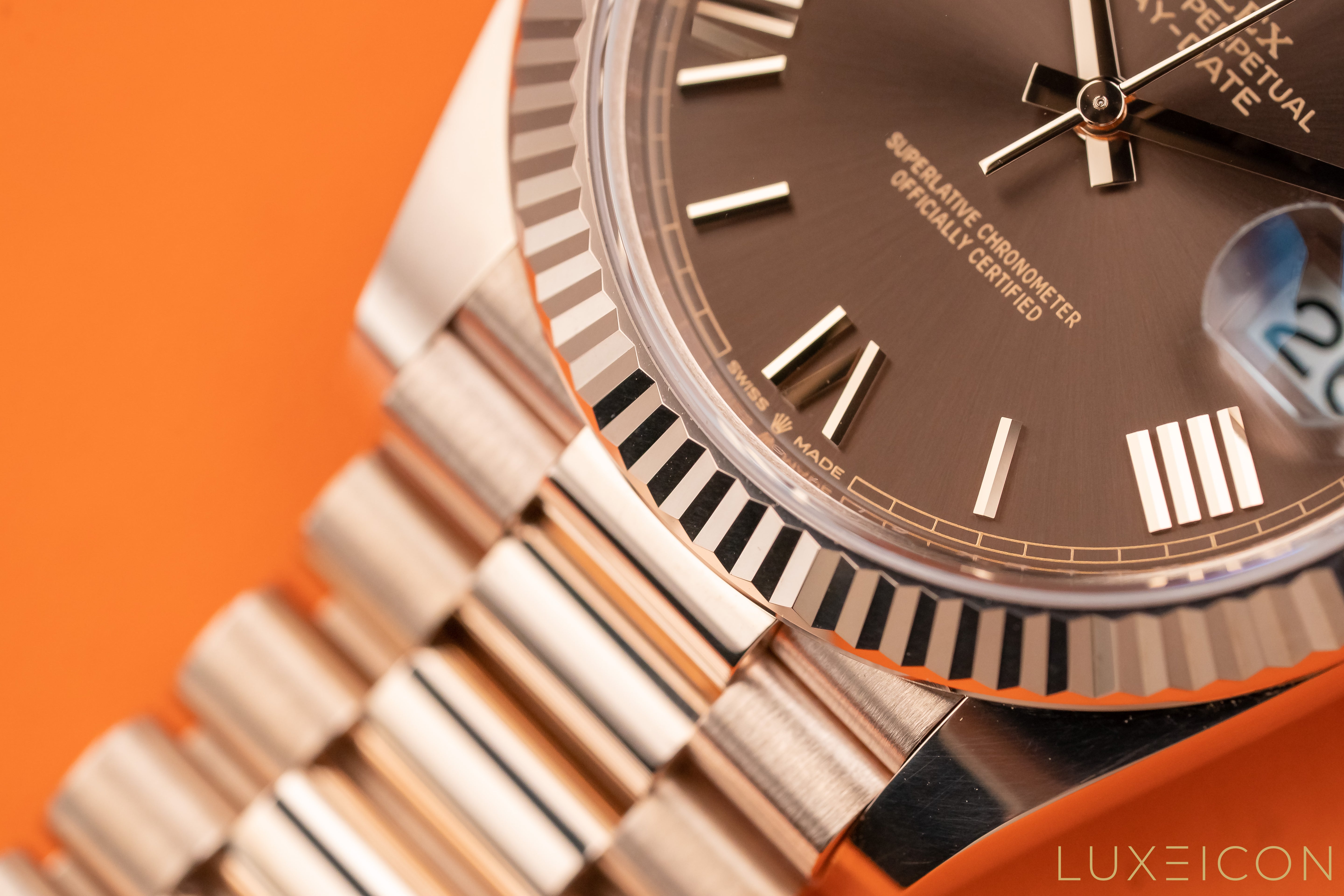 Rolex Day-Date 40mm Rose Gold Chocolate Roman Dial Fluted Bezel 228235