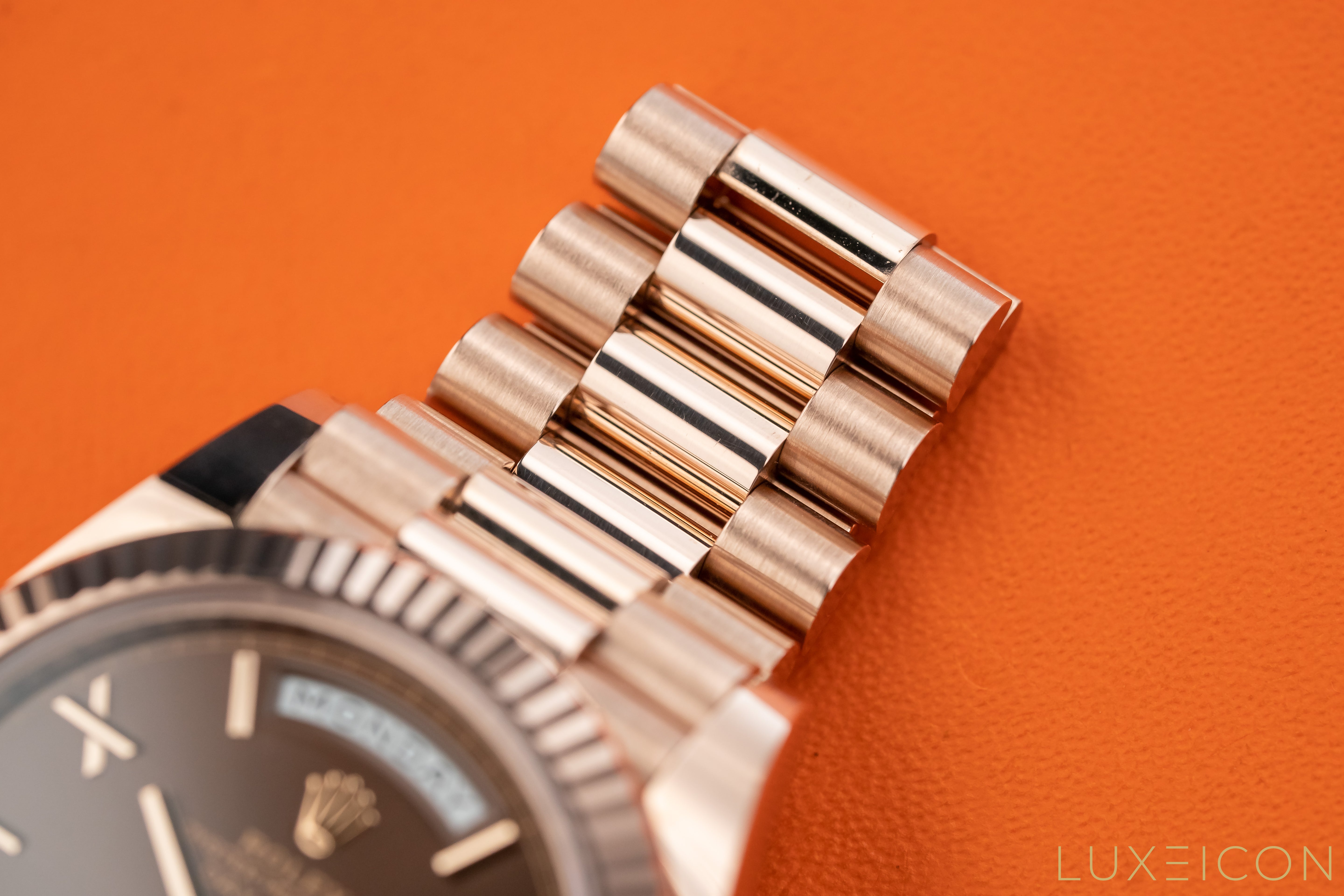 Rolex Day-Date 40mm Rose Gold Chocolate Roman Dial Fluted Bezel 228235