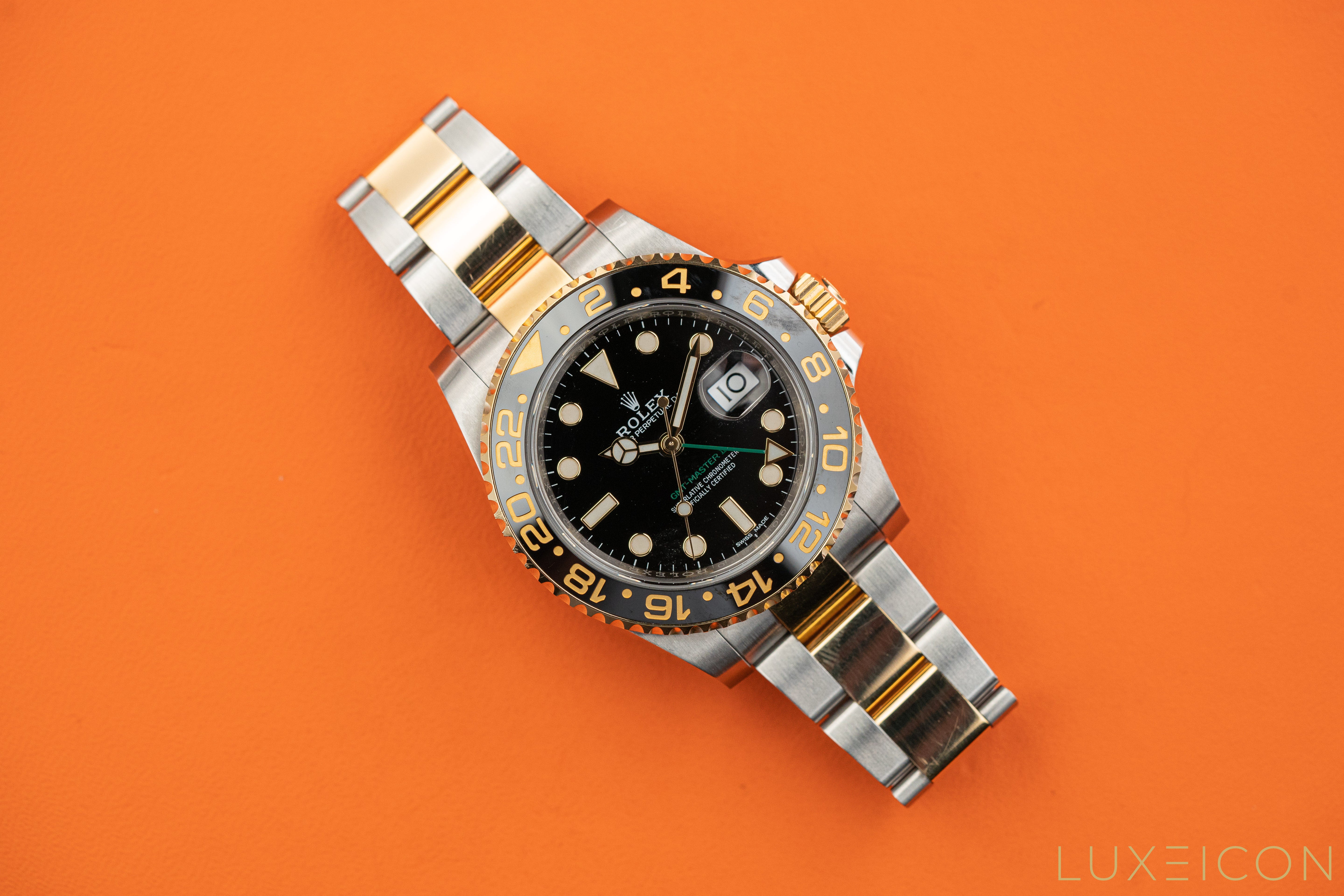 Rolex GMT-Master II Stainless Steel Two Tone Black Dial and Yellow Gold 116713LN