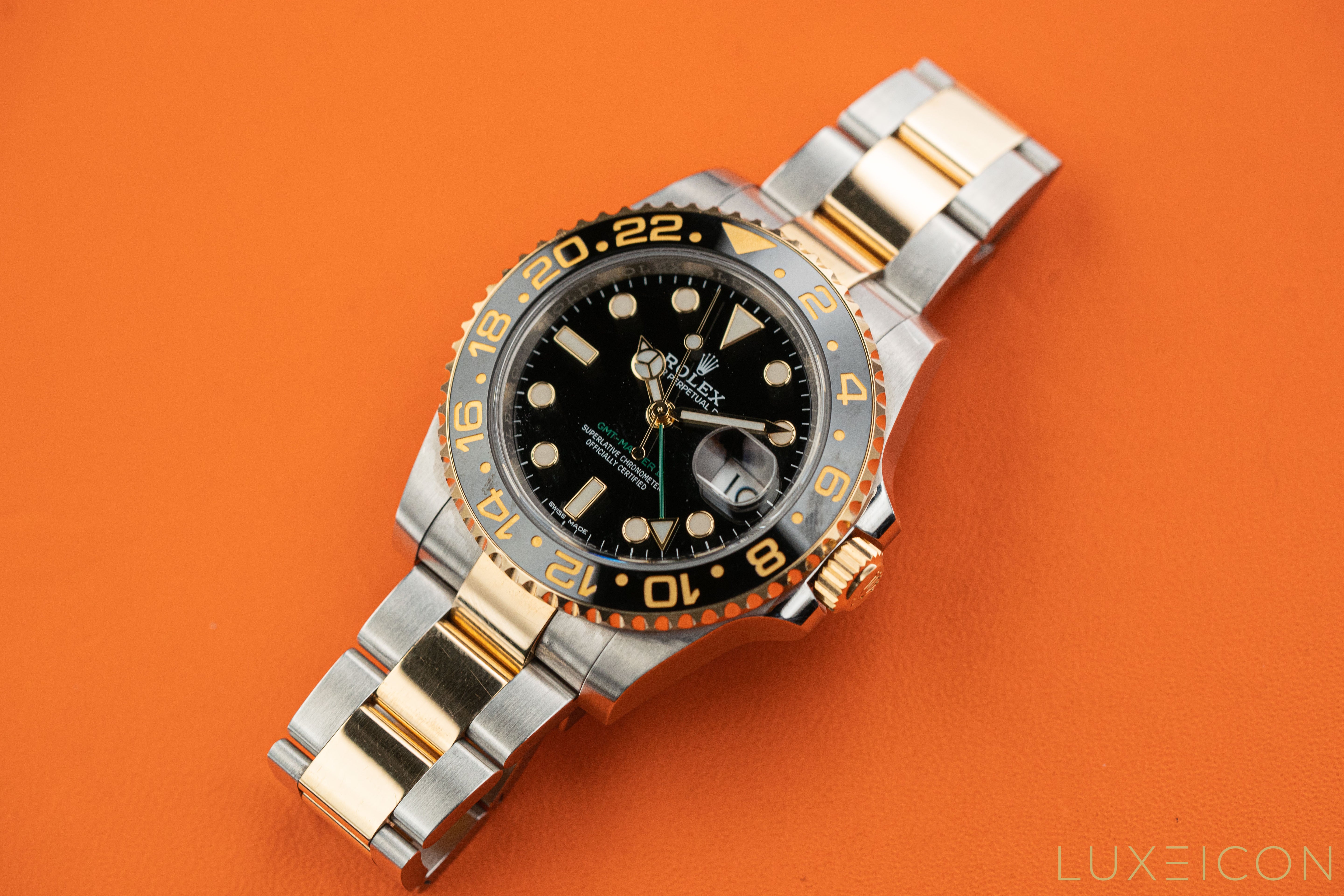 Rolex GMT-Master II Stainless Steel Two Tone Black Dial and Yellow Gold 116713LN