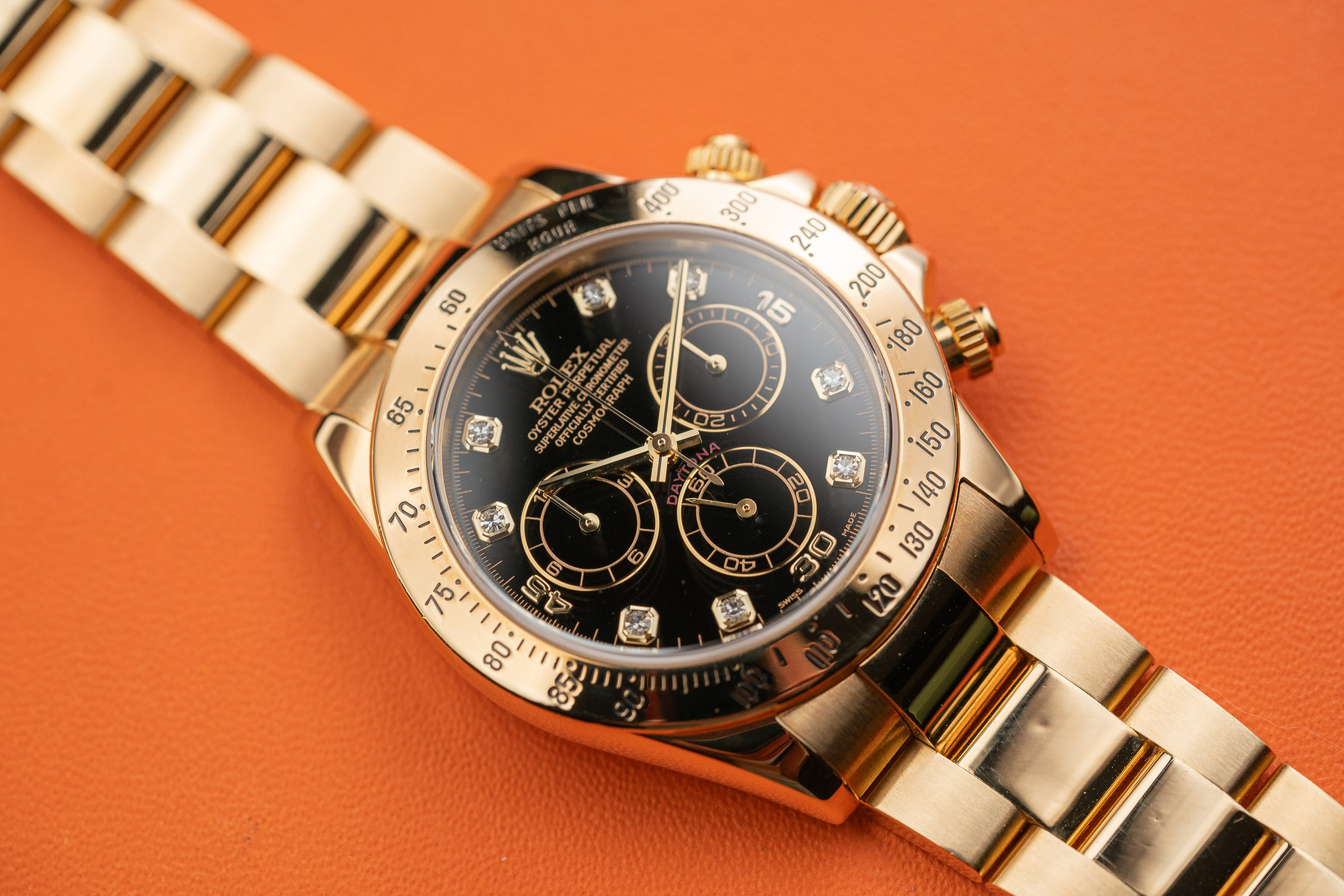 Rolex Daytona Chronograph 116528 18k Yellow Gold Black Diamond Dial 2005