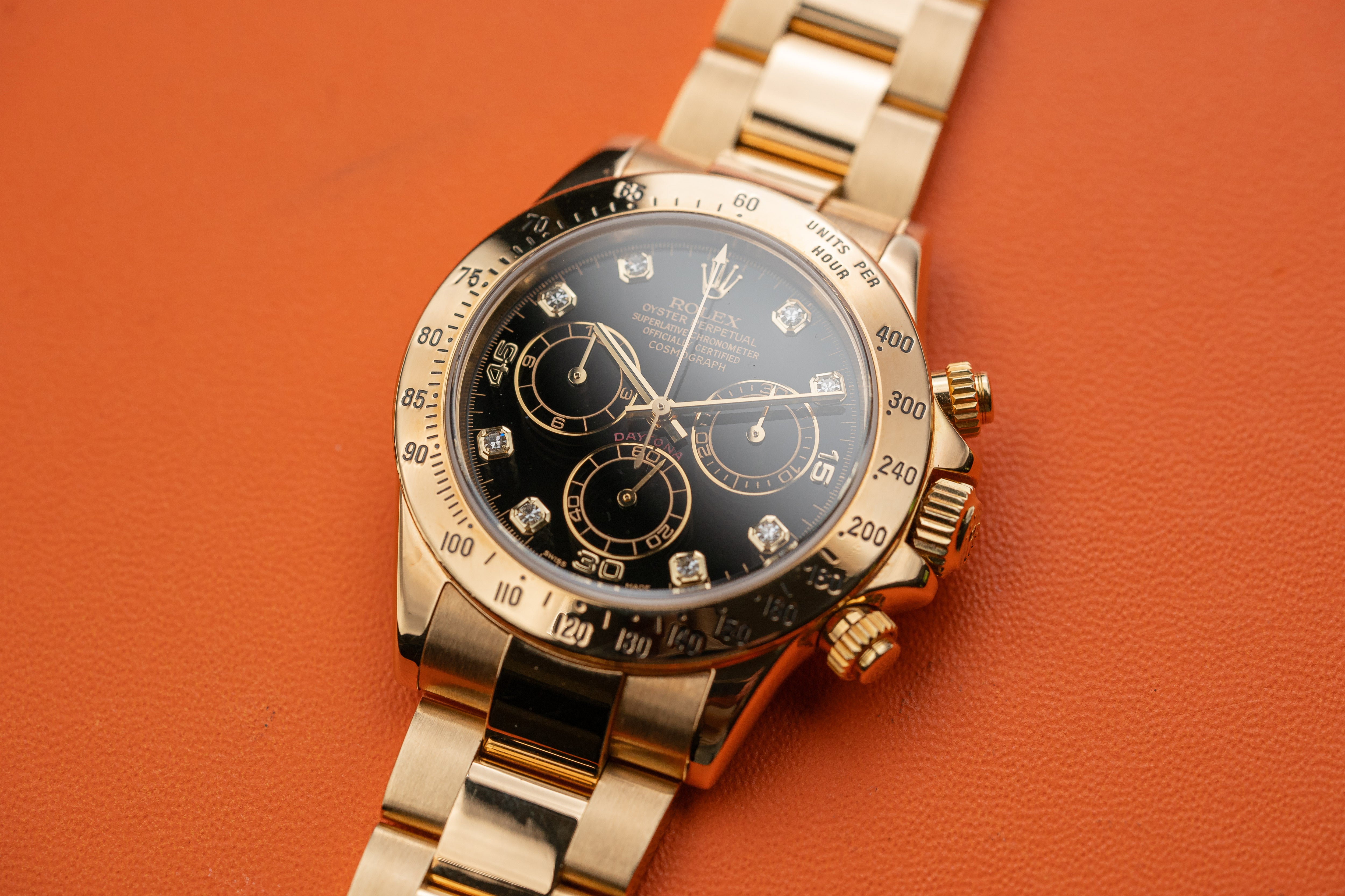 Rolex Daytona Chronograph 116528 18k Yellow Gold Black Diamond Dial 2005