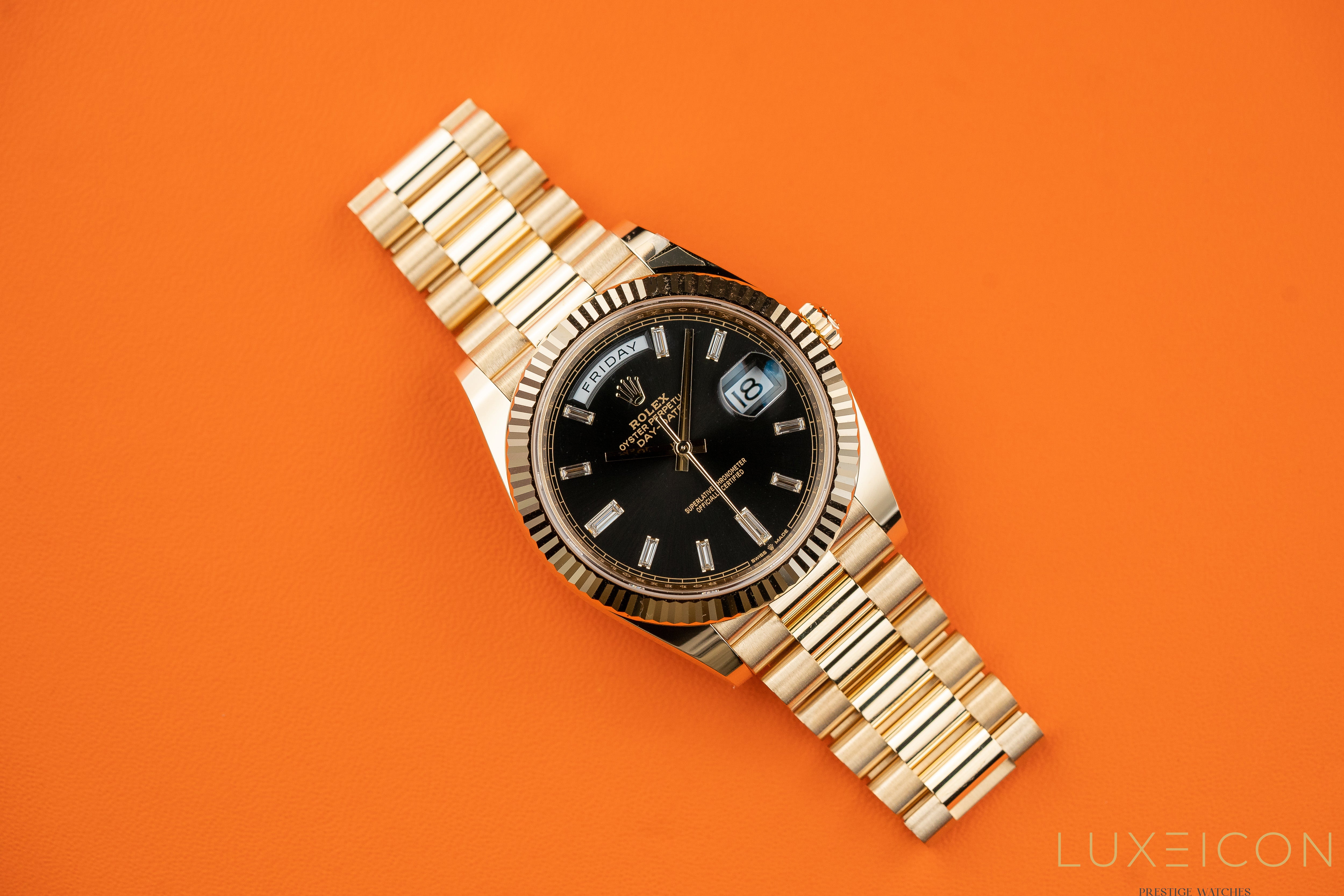 Rolex Day-Date 40 mm Yellow Gold Black Diamond Baguette 228238 2024