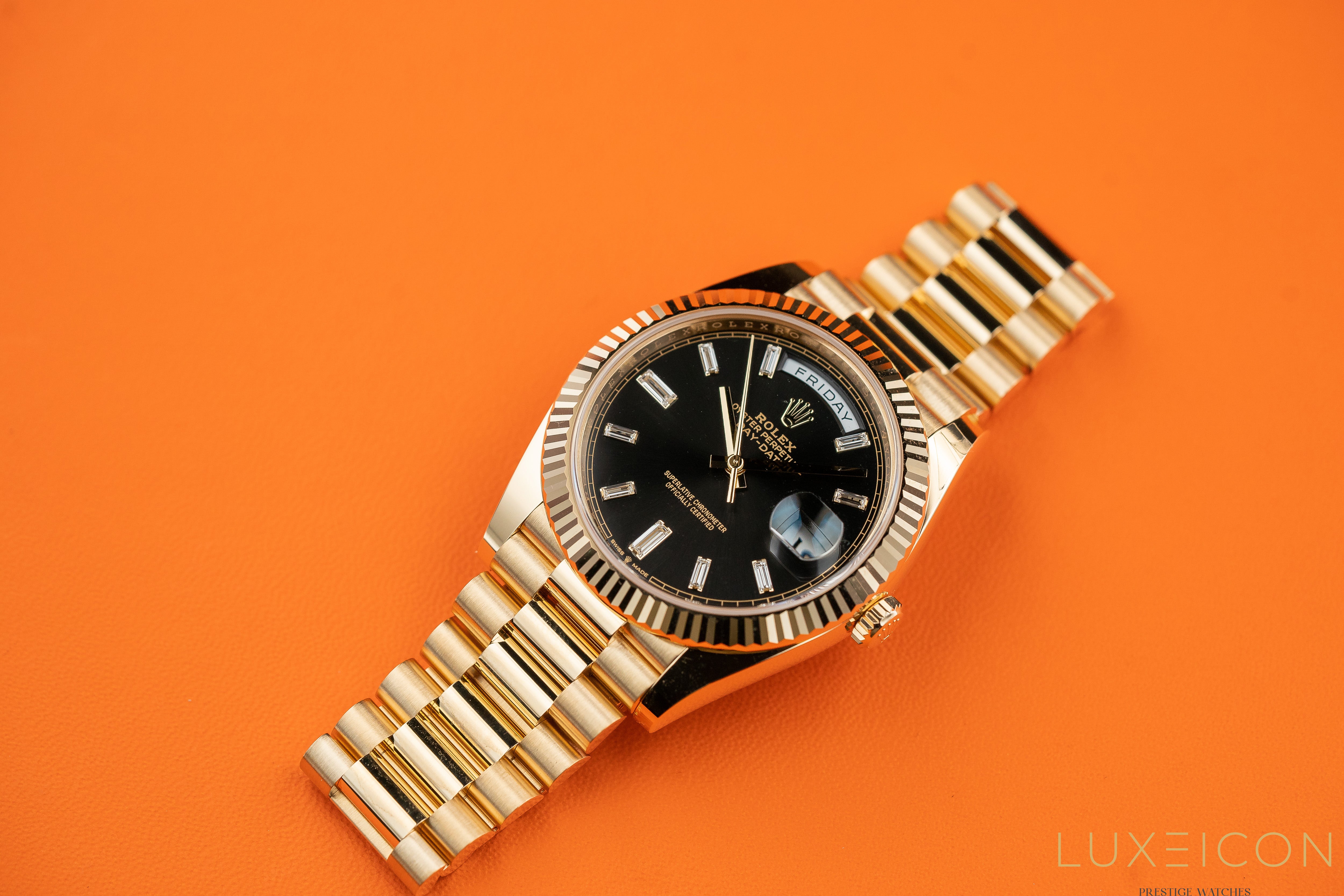 Rolex Day-Date 40 mm Yellow Gold Black Diamond Baguette 228238 2024