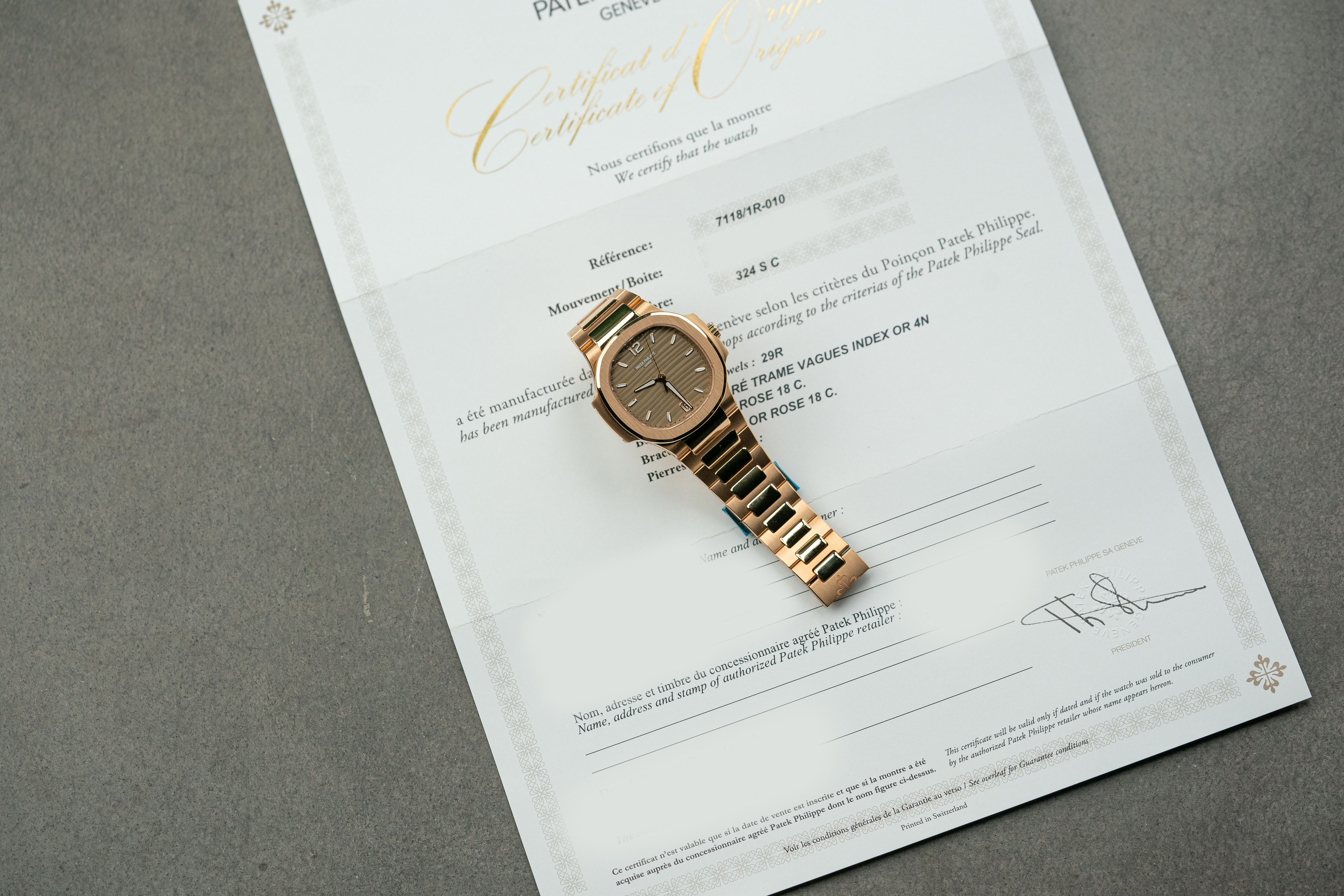 Patek Philippe Nautilus 7118/1R-010 35mm Rose Gold with Brown Opaline Dial