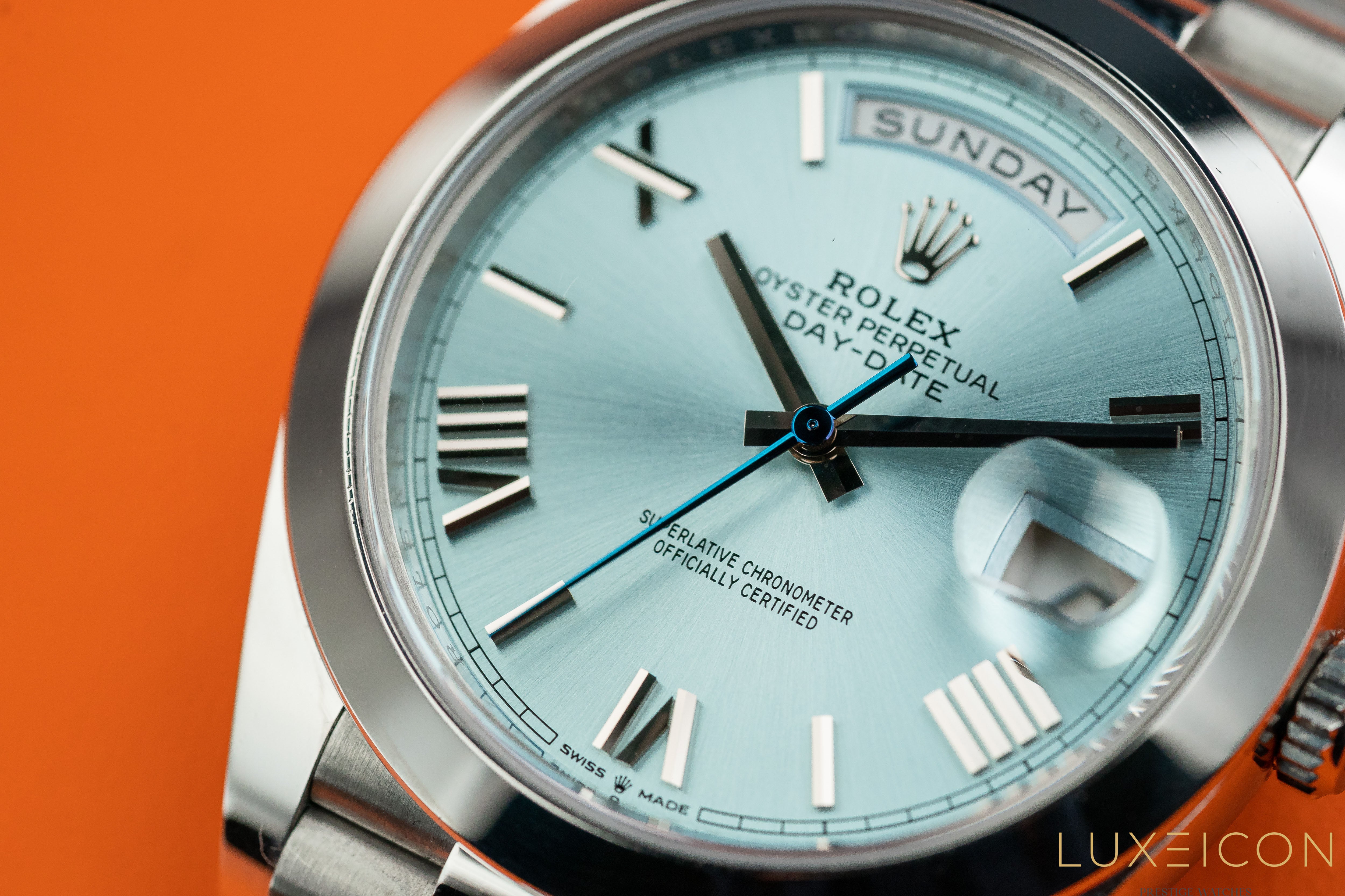 Rolex Day-Date 40MM Platinum Roman Ice Blue Dial Smooth Bezel 228206