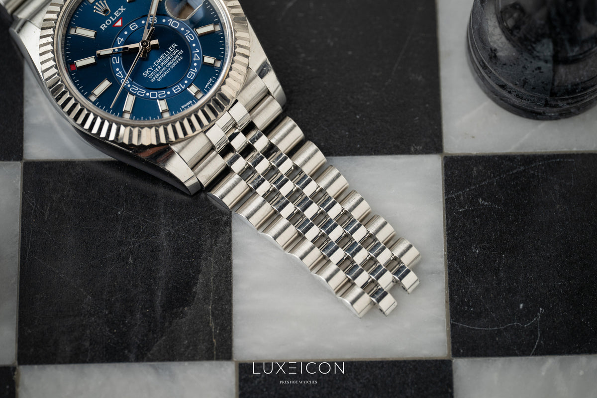 Rolex Sky-Dweller Stainless Steel Blue Dial Jubilee 326934 White Gold Fluted Bezel