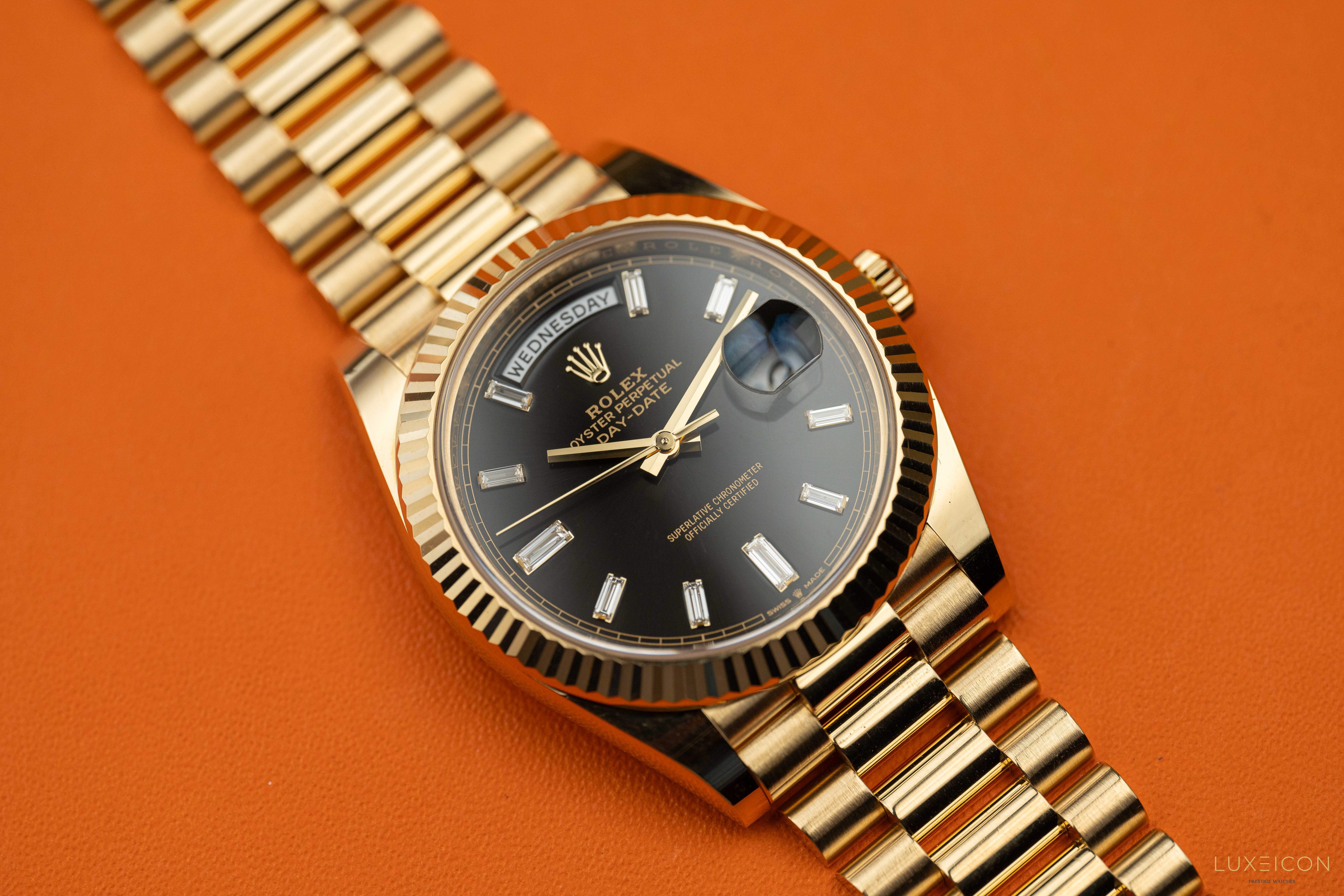 Rolex Day-Date 40 mm Yellow Gold Black Diamond Baguette 228238 2022