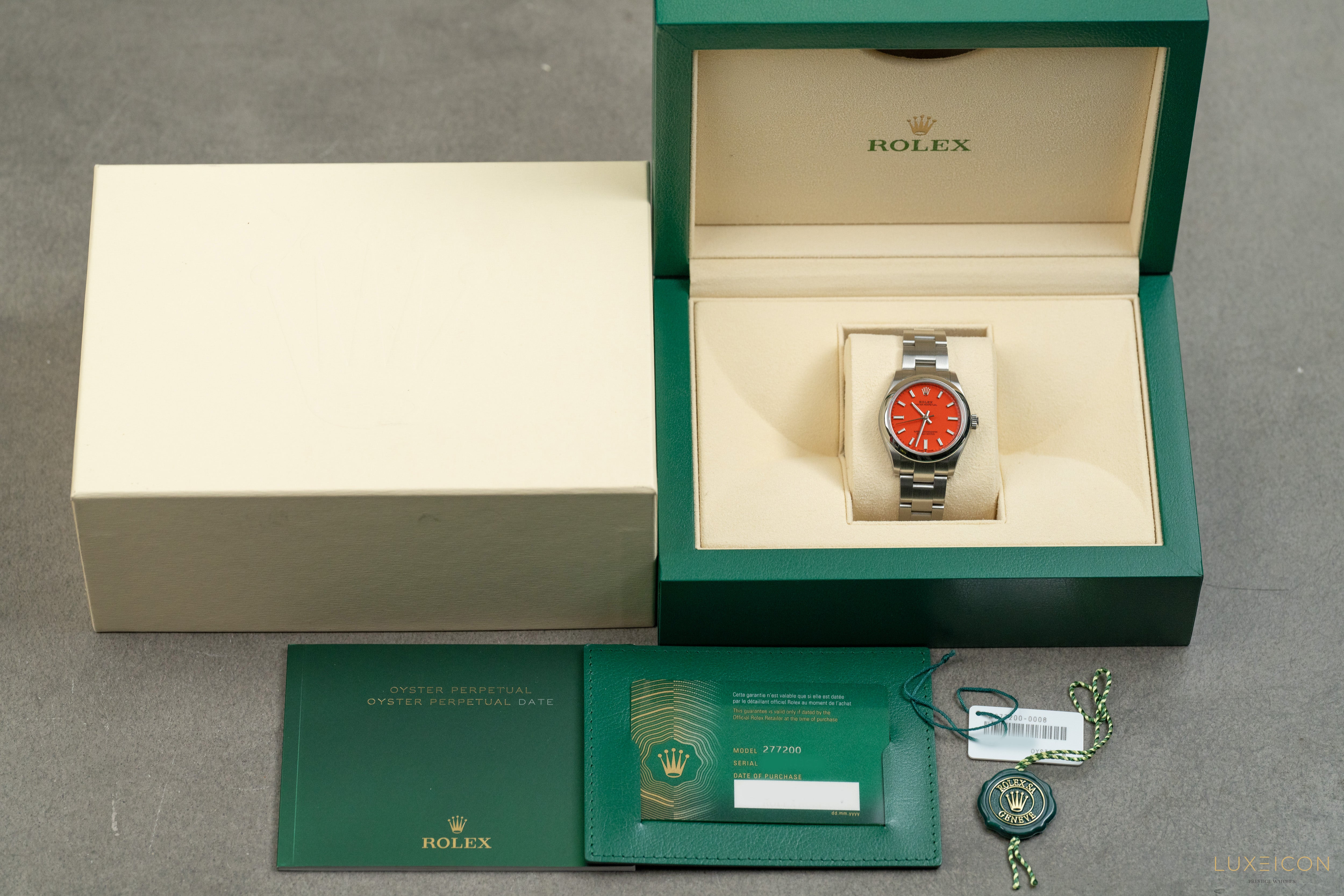 Rolex Oyster Perpetual 31mm Stainless Steel Smooth Bezel Coral Red Dial 277200 2021