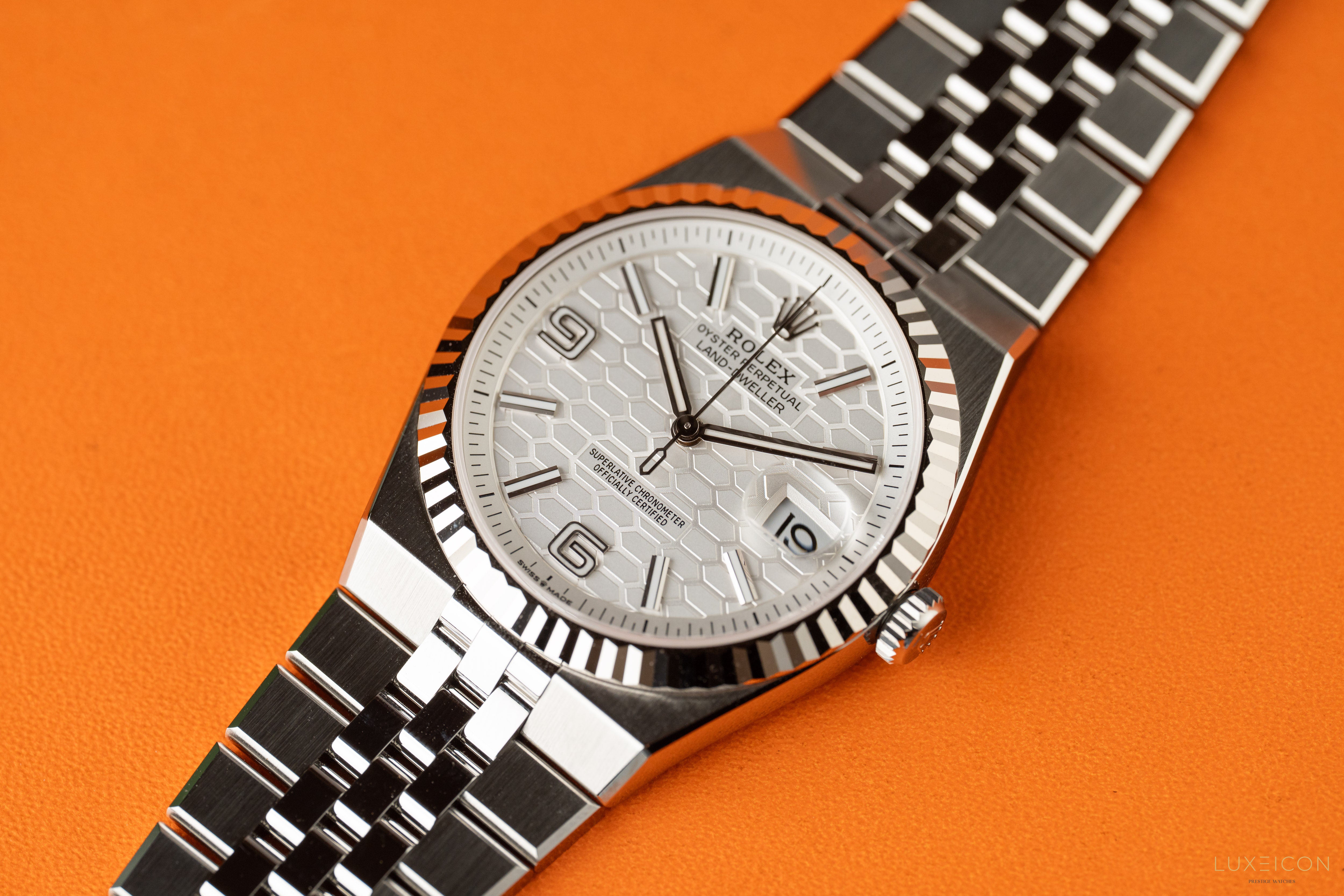 Rolex Land Dweller Oystersteel White Gold 40mm White Honeycomb Motif Dial 127334