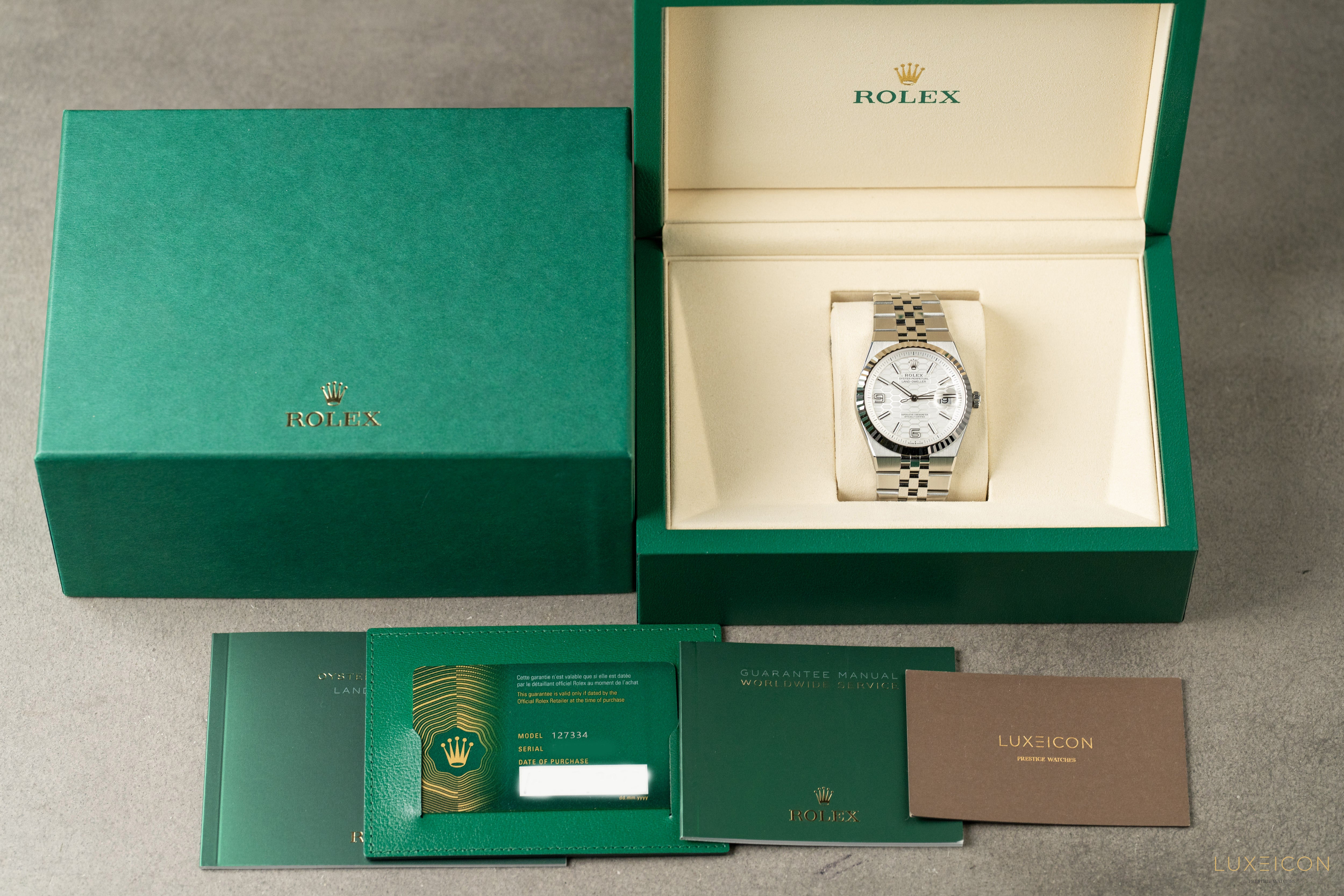 Rolex Land Dweller Oystersteel White Gold 40mm White Honeycomb Motif Dial 127334