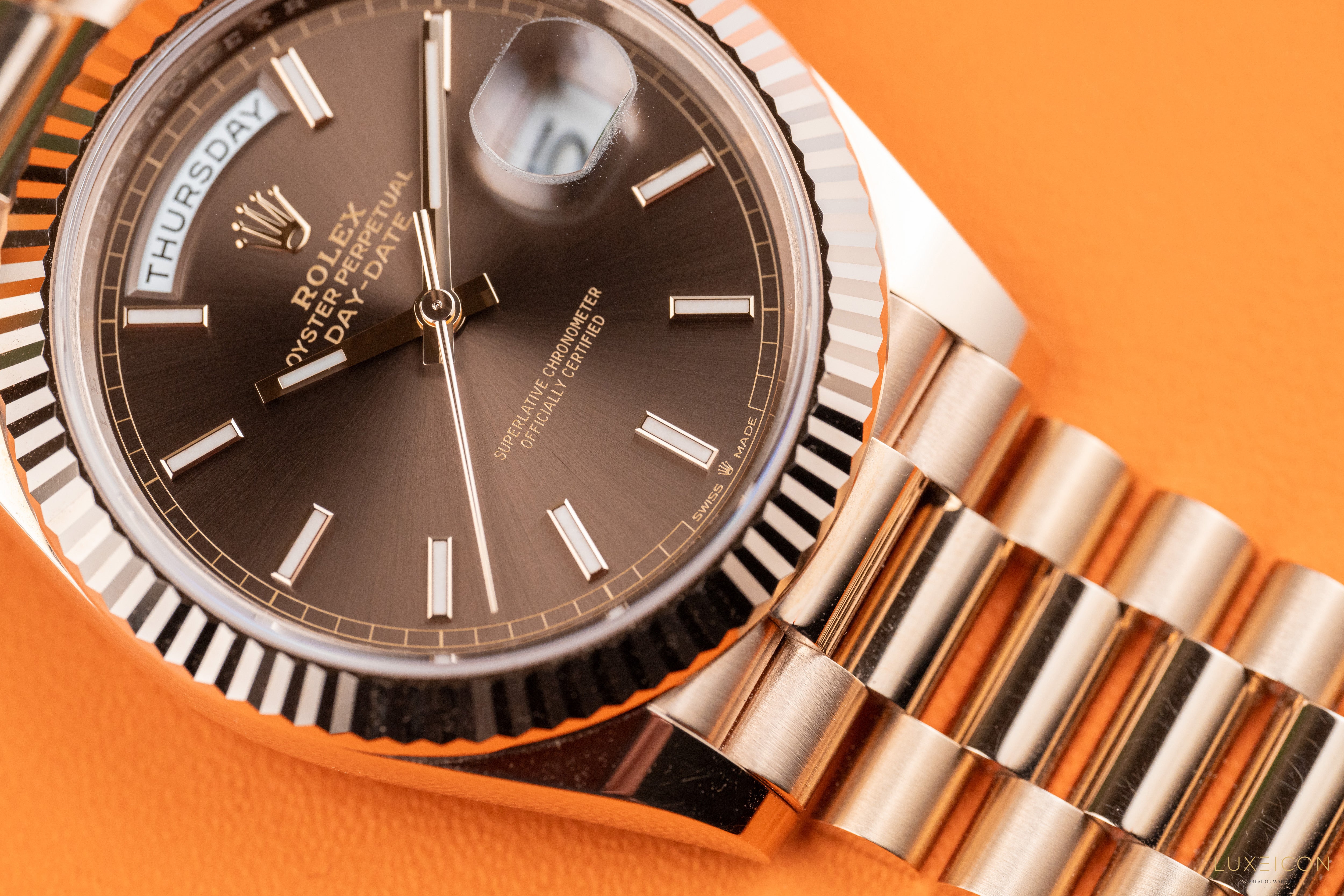 Rolex Day-Date 40 President Rose Gold Chocolate Index Dial 228235