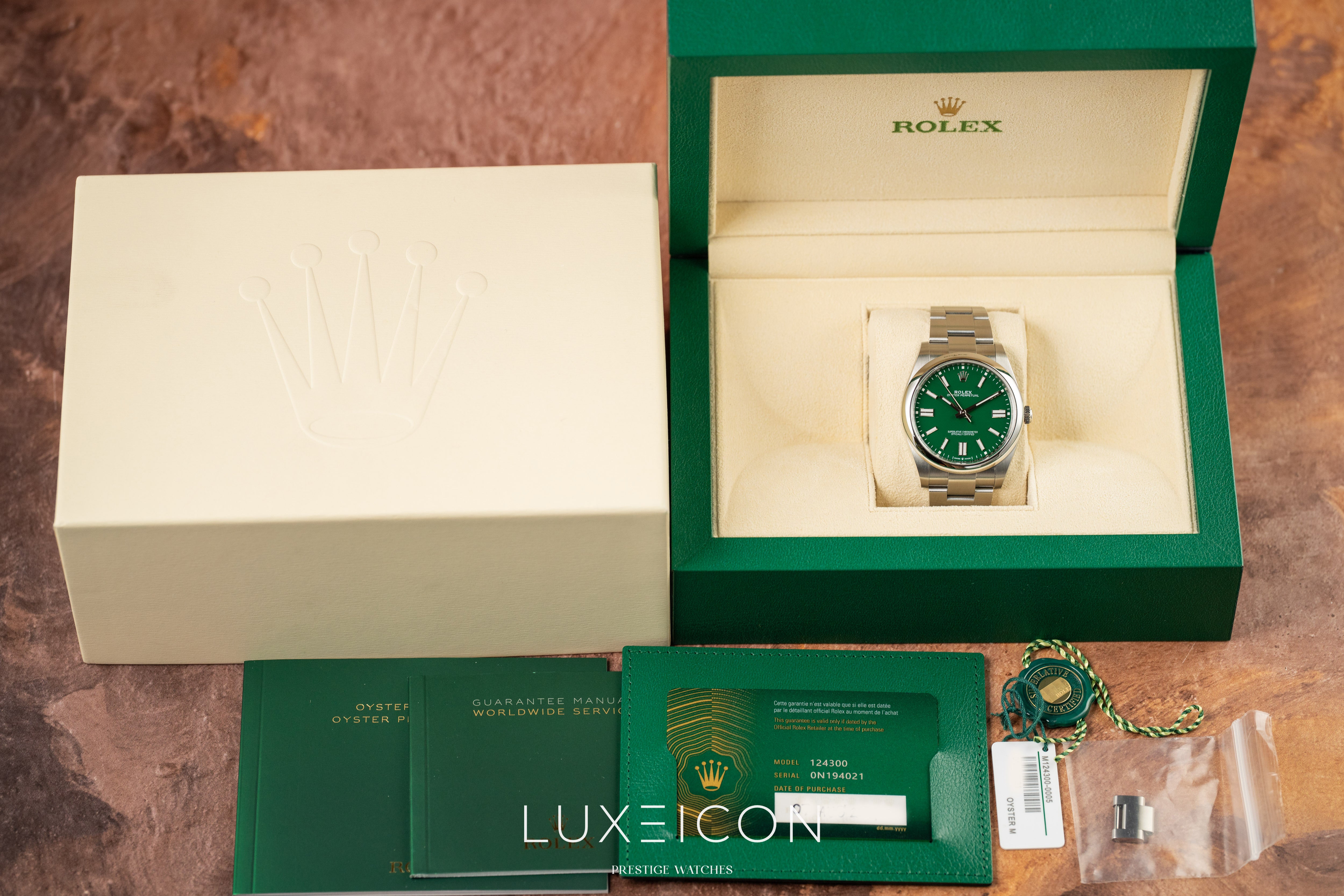 Rolex Oyster Perpetual 124300 41mm Green Index Dial Smooth Bezel 2024