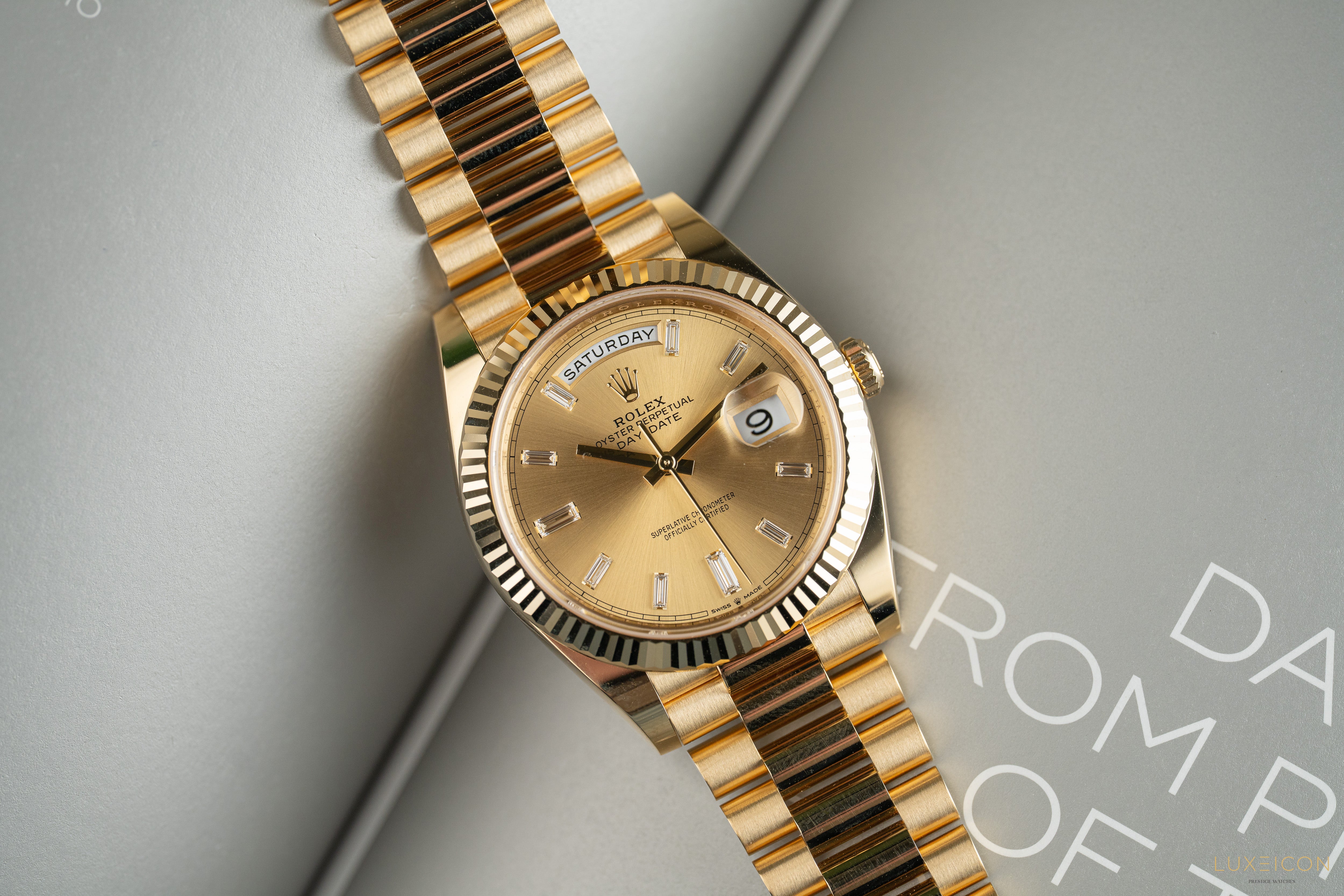 Rolex Day-Date 40mm 228238 Champagne 18K Yellow Gold President Diamond Baguette 2025